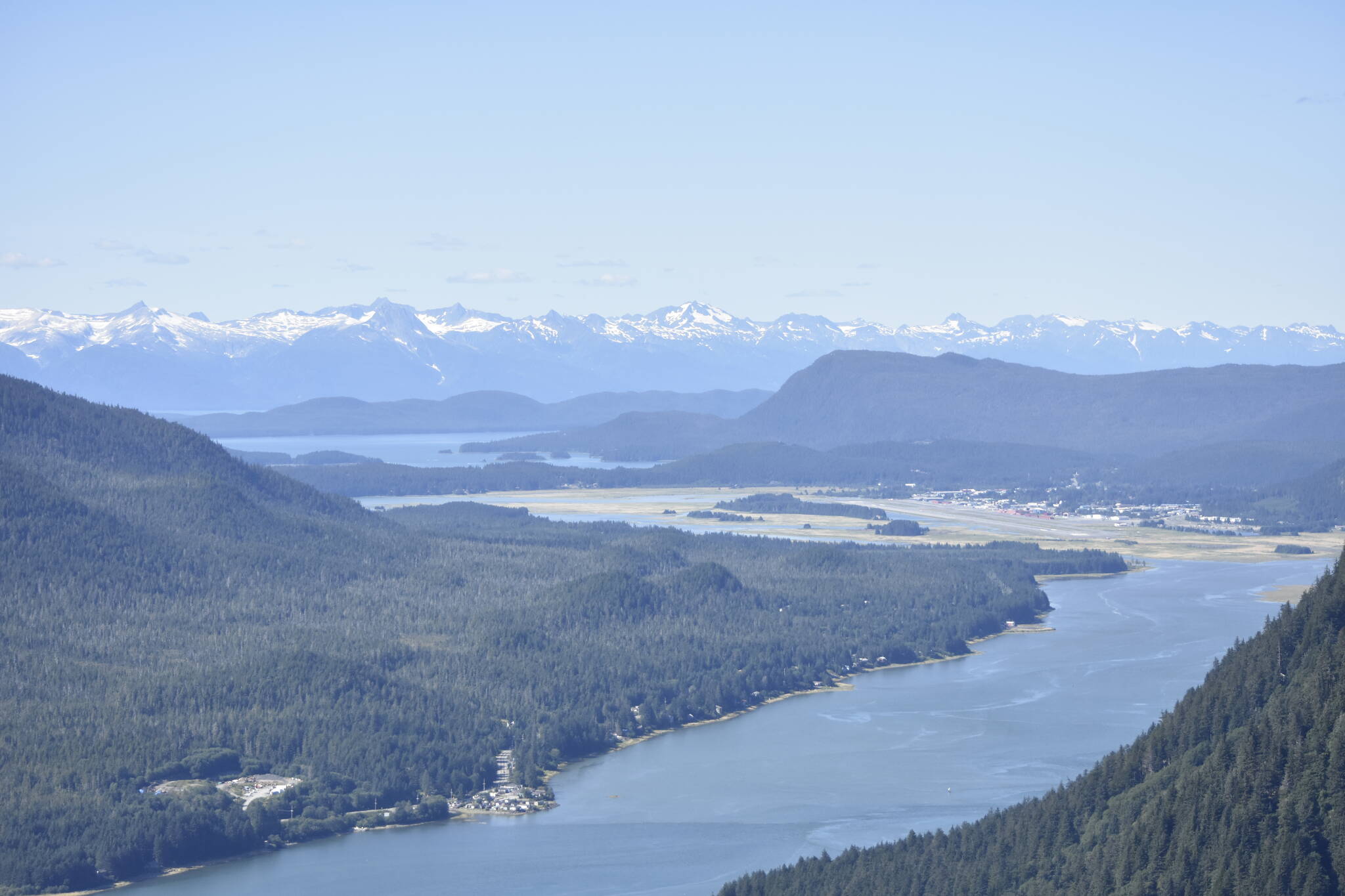 The Alaska Department of Transportation and Public Facilities is currently working on a study for a second crossing across the Gastineau Channel, seen here on Aug. 22, 2021, to North Douglas Island. The public outreach portion of the study is set to begin in May, according to DOT. (Peter Segall / Juneau Empire)