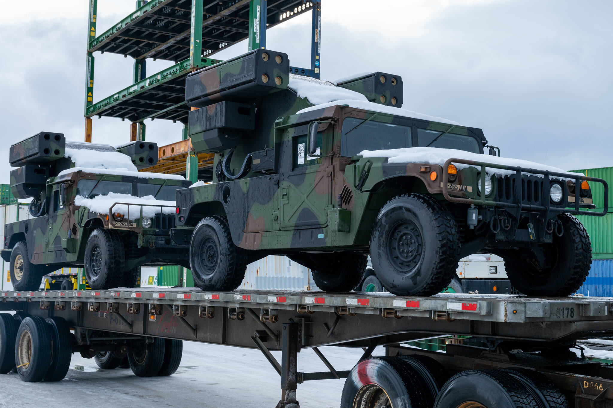 Two Avenger Air Defense Systems sit on a flatbed trailer at the Port of Anchorage, Anchorage, Alaska, Feb. 25, 2022 for exercise Arctic Edge 2022. (U.S. Air Force photo / Airman 1st Class Andrew Britten)