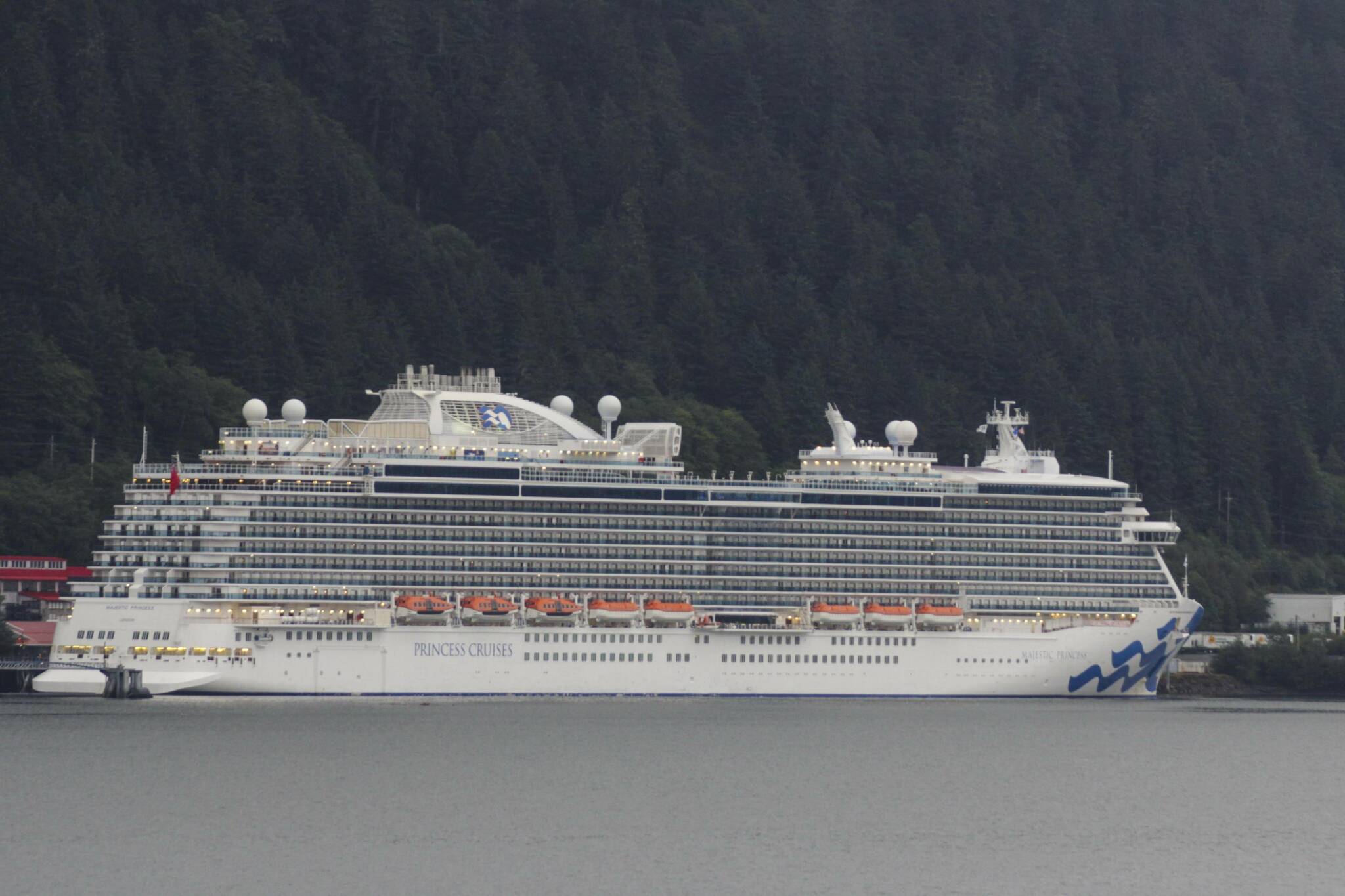 This August 2021 photo shows a Princess Cruise Line ship docked in Juneau. The cruise line announced this week that a controversial contactless payment method will not be expanded to Alaska in the immediate future. Prior to the decision, MedallionPay was panned by members of the business community.  (Michael Lockett / Juneau Empire file)