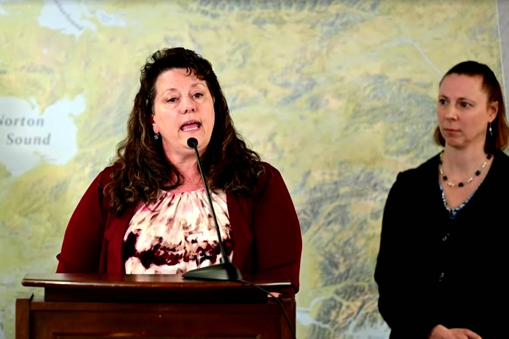 Alaska Department of Natural Resources Commissioner Corri Feigi, right, and Deputy Attorney General Cori Mills, announced alongside Gov. Mike Dunleavy the state was issuing lawsuits against the federal government for its failure to convey submerged lands to the state. Feige said at the conference the state's rule applied to navigable waterways including Mendenhall Lake and said motorized boats were allowed on the lake. (Screenshot)