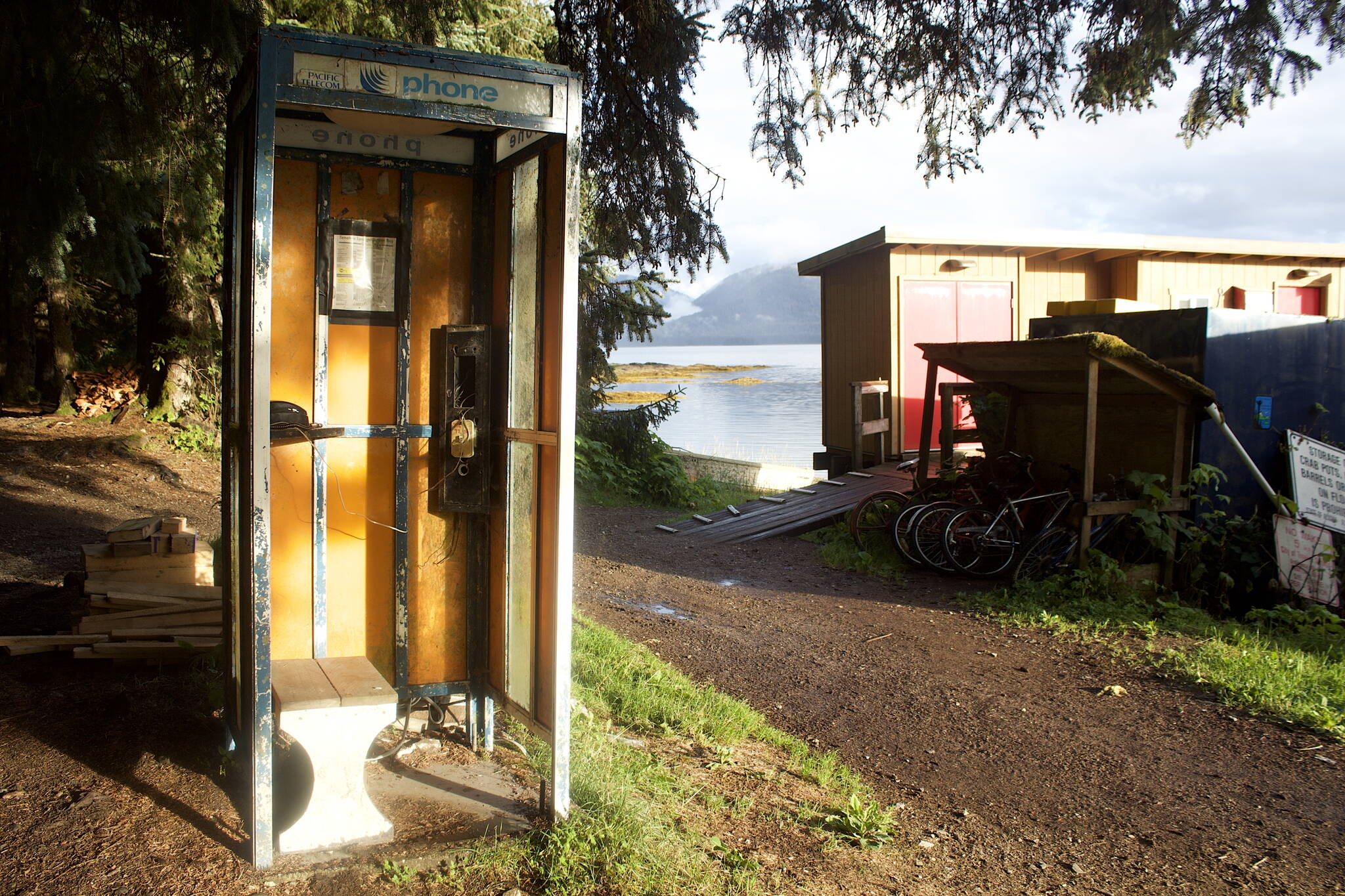 Mark Sabbatini / Juneau Empire
A telephone booth, one of two in Tenakee Springs, awaits callers near the recreational boat harbor at the edge of town.