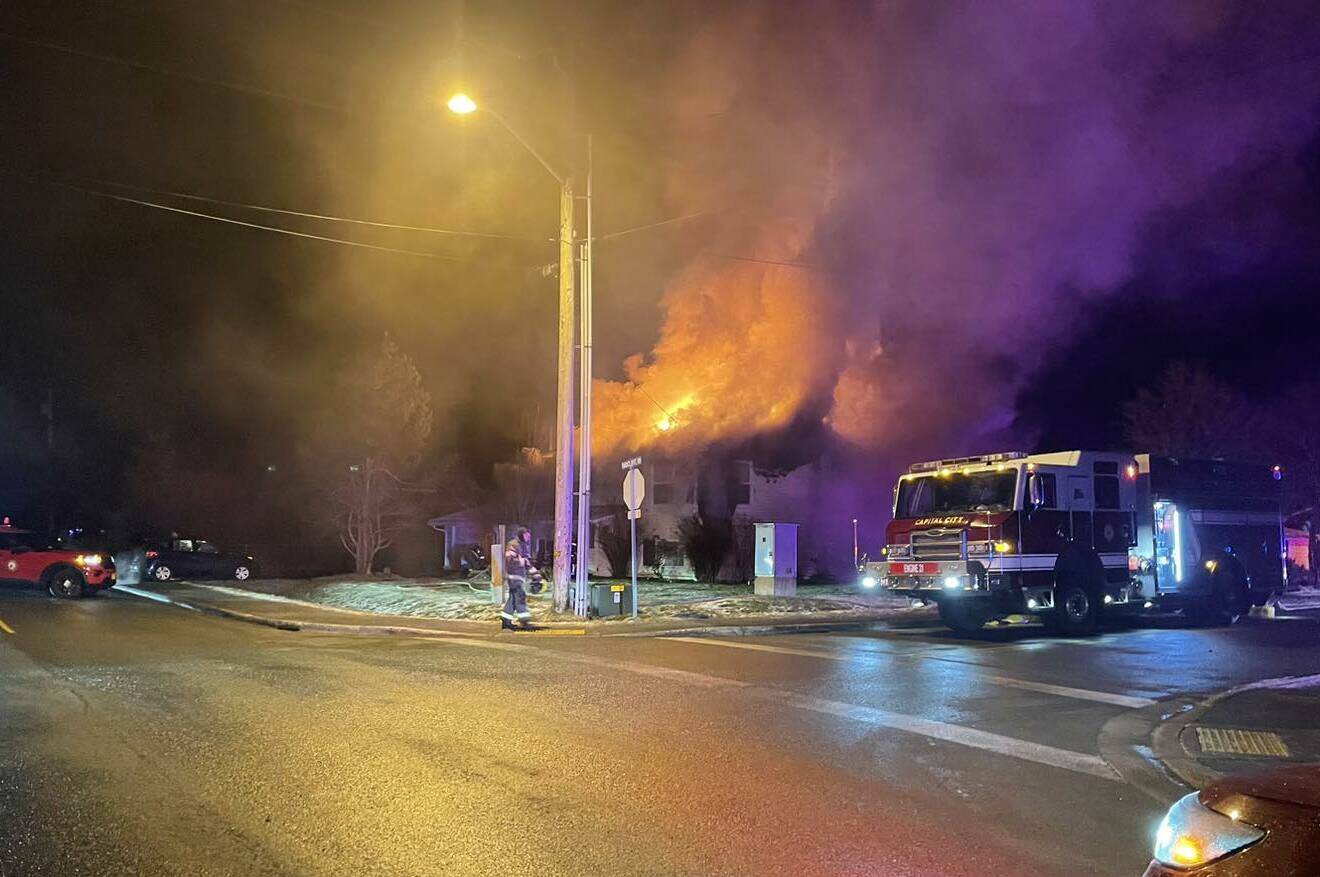 CCFR crews work to extinguish a house fire in the 2200 block of Radcliffe Road early Monday morning. All occupants of the home were able to escape safely without injury. (Courtesy Photo / CCFR)
