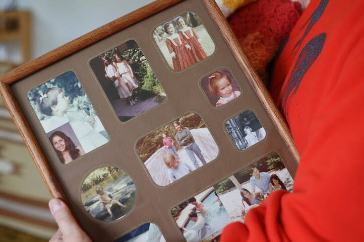 Faith Rogers’ younger sister Michelle Rogers holds a photo collage of Faith that hung on the wall in their family home in September 2022. A readiness hearing was held Wednesday for Anthony Michael Migliaccio, who was indicted in late November 2022 on two counts of second-degree murder and a charge of manslaughter. (Clarise Larson / Juneau Empire)