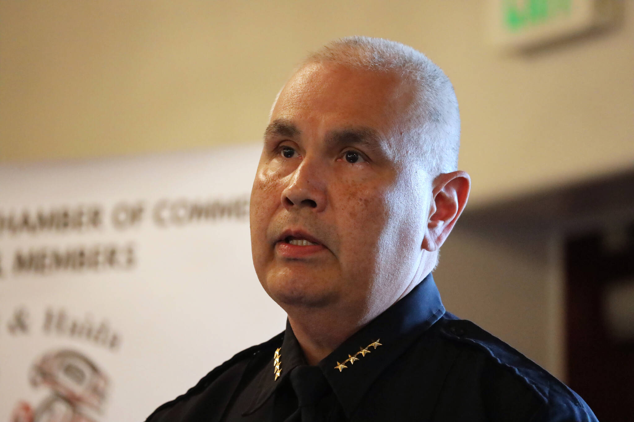 Juneau Chief of Police Ed Mercer speaks to the Greater Juneau Chamber of Commerce Thursday afternoon ahead of his retirement slated for Monday, July 31. (Clarise Larson / Juneau Empire)