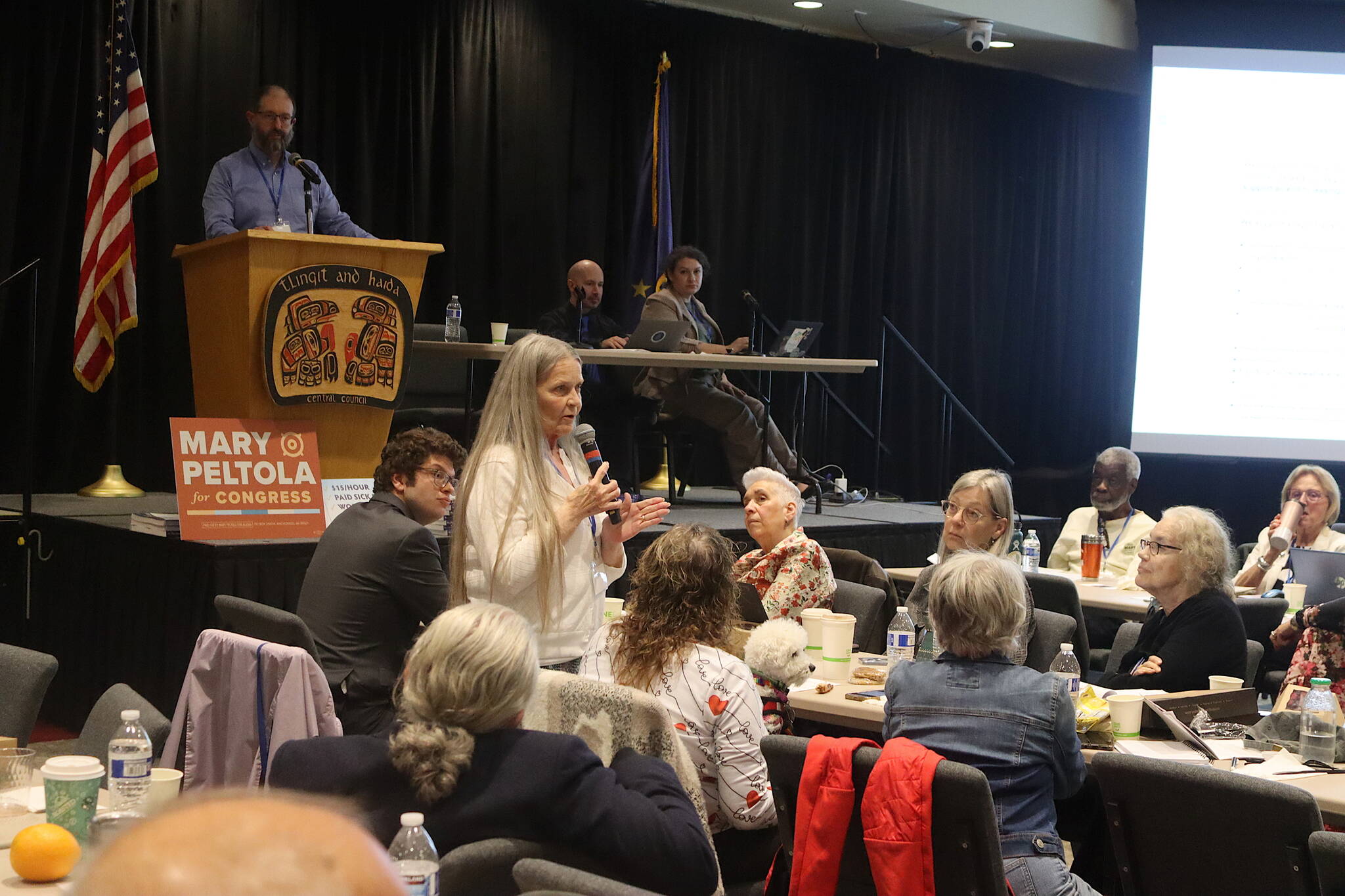 Fay Herold, a delegate at the Alaska Democratic Party’s state convention, expresses concerns about a proposed change to the party’s platform on Saturday at Elizabeth Peratrovich Hall. (Mark Sabbatini / Juneau Empire)