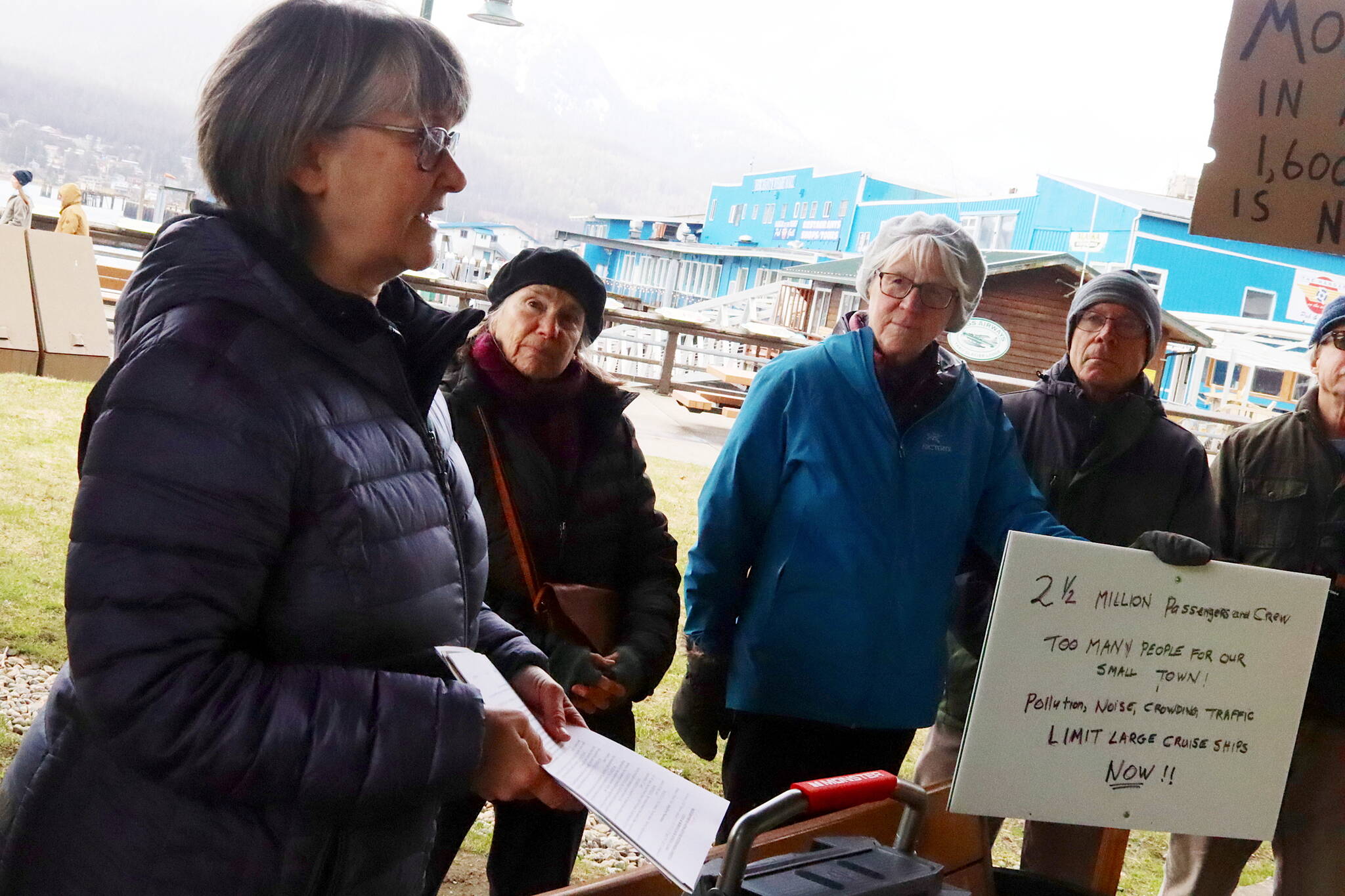 Karla Hart leads a rally in Marine Park on April 9 calling for a ban on large cruise ships on Saturdays in Juneau. Supporters turned in signatures on Thursday for a petition seeking to put the question to local voters. (Mark Sabbatini / Juneau Empire file photo)