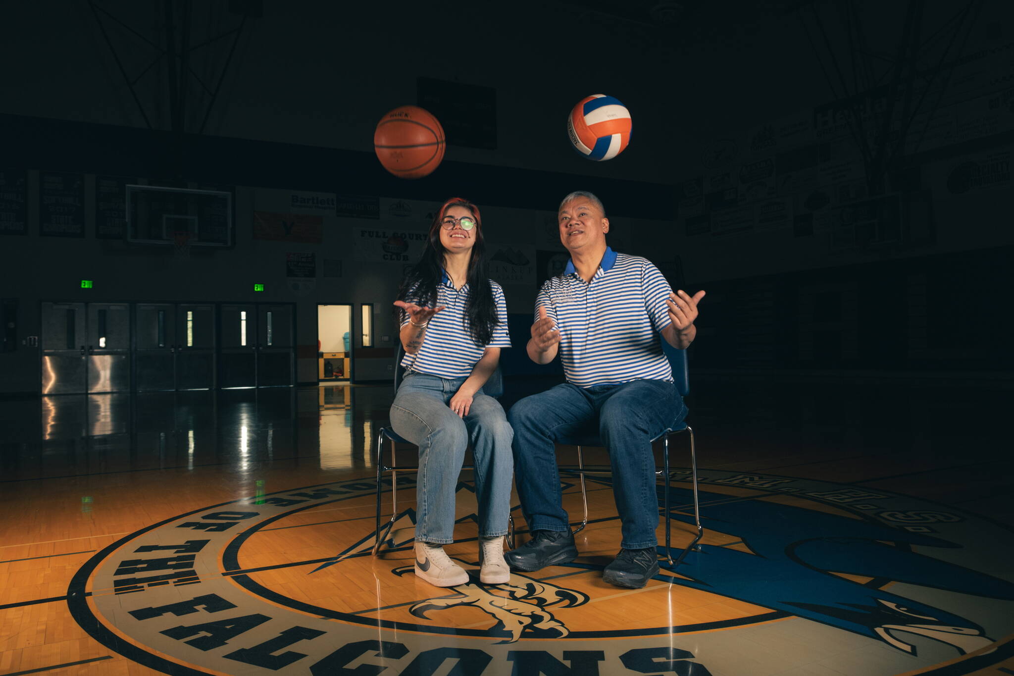 Former Thunder Mountain High School JV basketball coach Kylie Ibias, and former TMHS JV basketball and volleyball coach Arnold Ibias sit in the TMHS gymnasium during an interview for a soon-to-be released documentary. (Photo courtesy of Sonny Hunt-Mauricio)