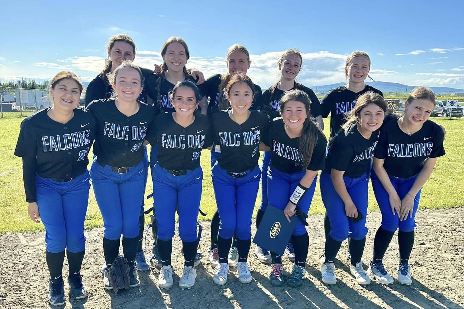 Members of the Thunder Mountain High School softball team pose for a shot following their 18-0 victory against North Pole High School on Friday during the Division II Alaska School Activities Association Softball State Championships in Fairbanks. (Thunder Mountain Softball photo)
