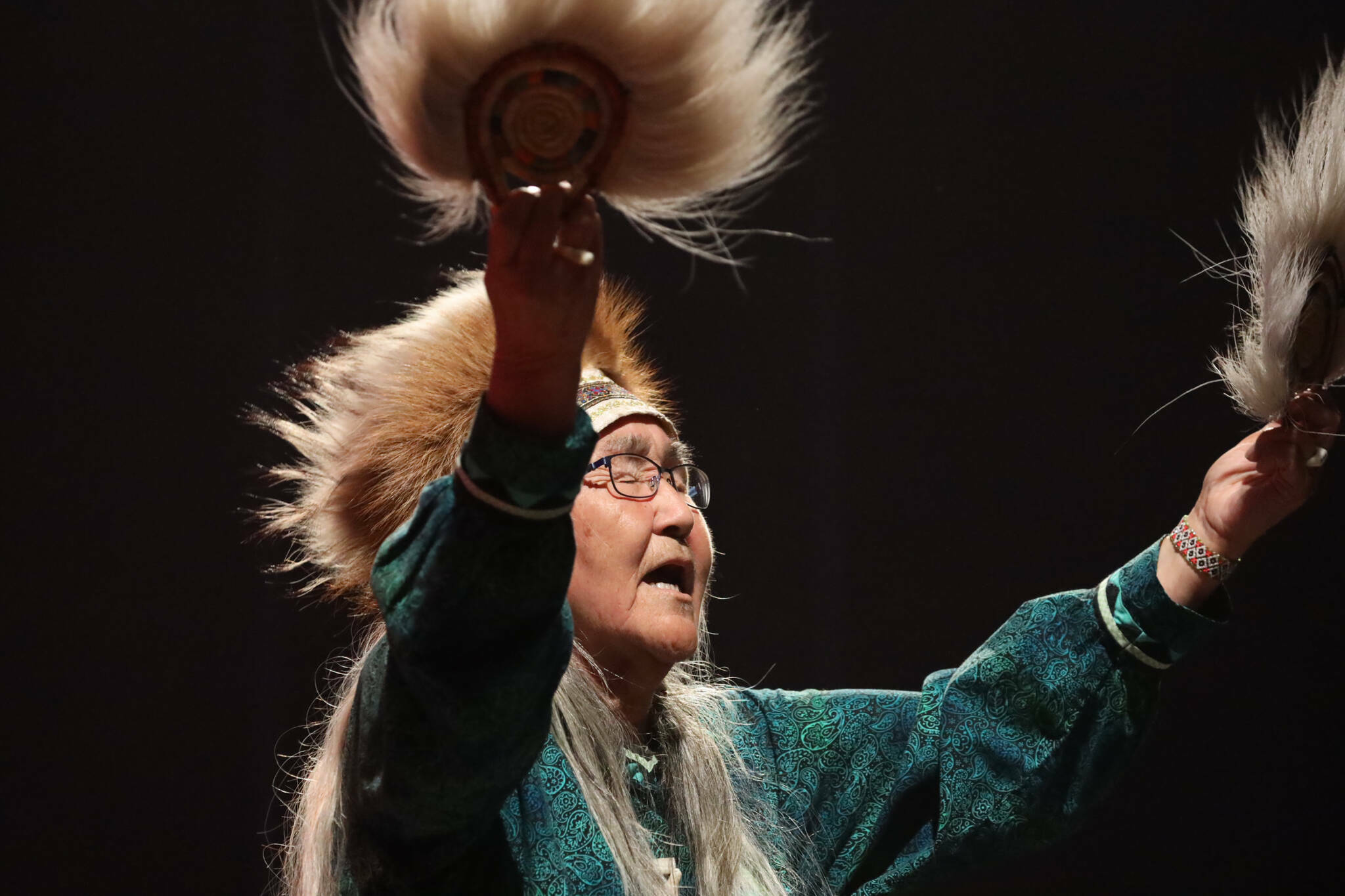 Marie Mead performs a traditional dance during the Inuit-soul musical group Pamyua’s performance as part of the final night of the Áak’w Rock music festival at Centennial Hall on Sept. 23, 2023. (Clarise Larson / Juneau Empire file photo)