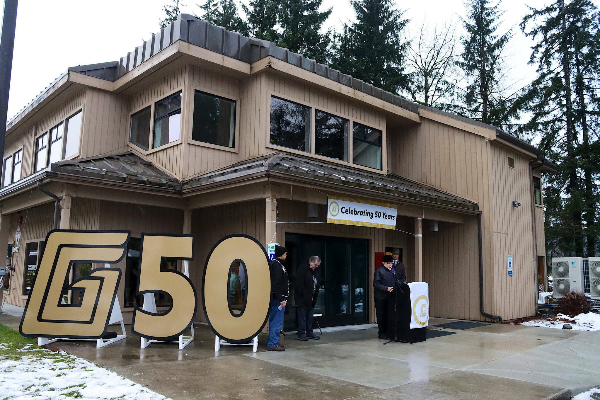 A celebratory sign stands outside Goldbelt Inc.’s new building during the Alaska Native Regional Corporation’s 50th-anniversary celebration on Jan. 4. (Mark Sabbatini / Juneau Empire file photo)