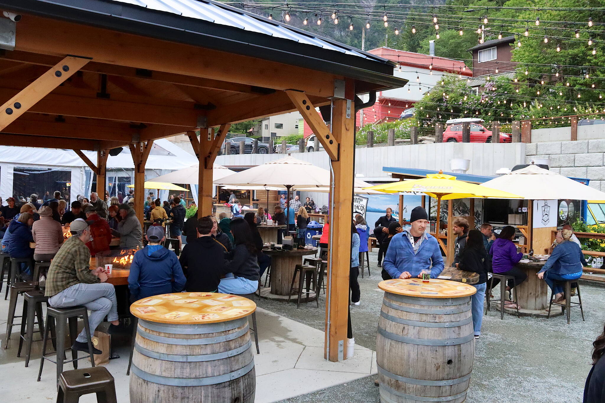 Customers gather in the seating area of an expanded food court area on Franklin Street on Friday. Reconstruction work that began last fall was recently completed for the facility scheduled to be open between May and September. (Mark Sabbatini / Juneau Empire)