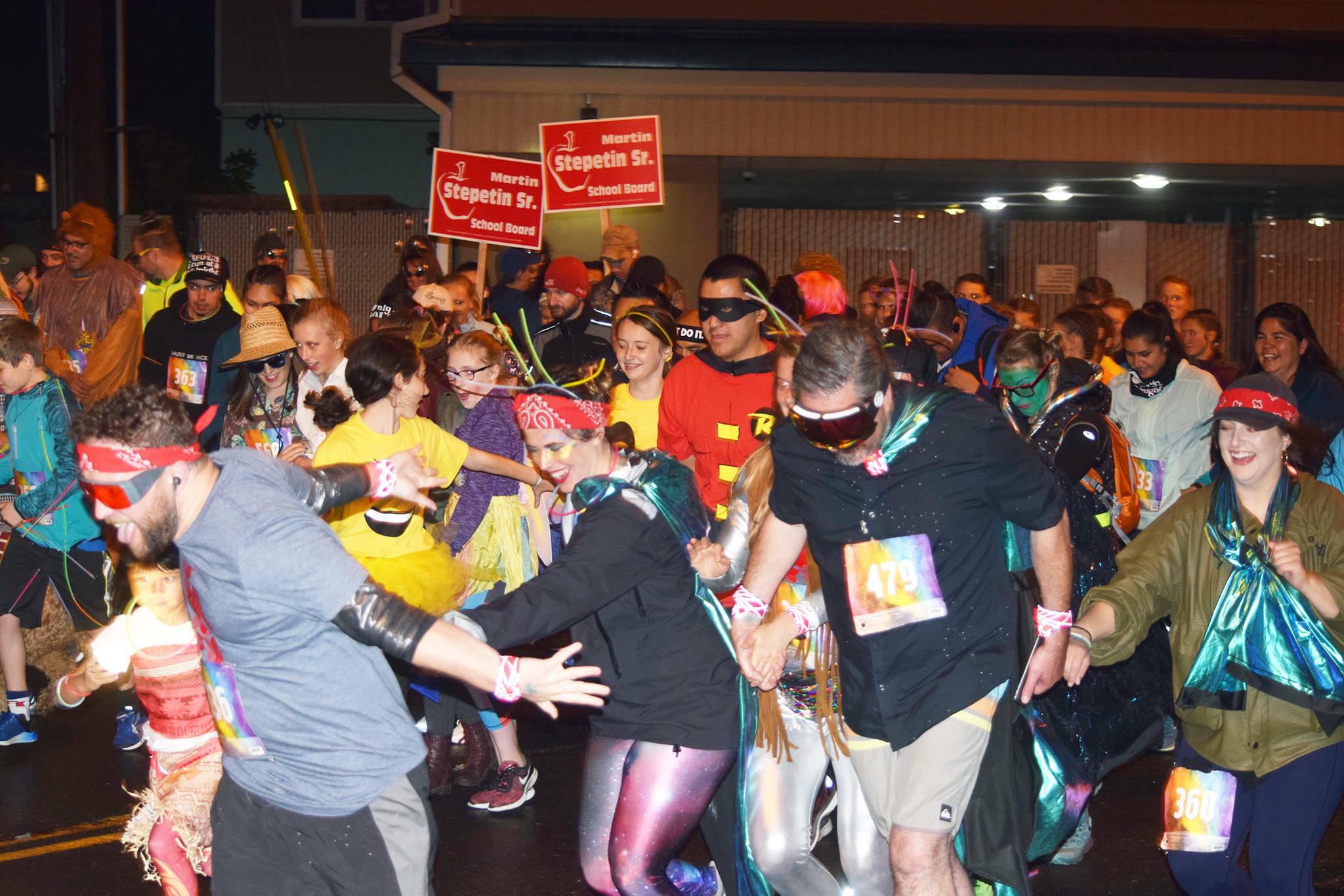 Runners take off from the starting line of the 35th annual Only Fools Run at Midnight at 11:59 p.m. on Saturday, Sept. 21, 2019. The event included a costume contest and 1-mile and 5-kilometer run/walk/wheelchair. The event is being revived this year at 9 p.m. Friday. (Nolin Ainsworth / Juneau Empire file photo)