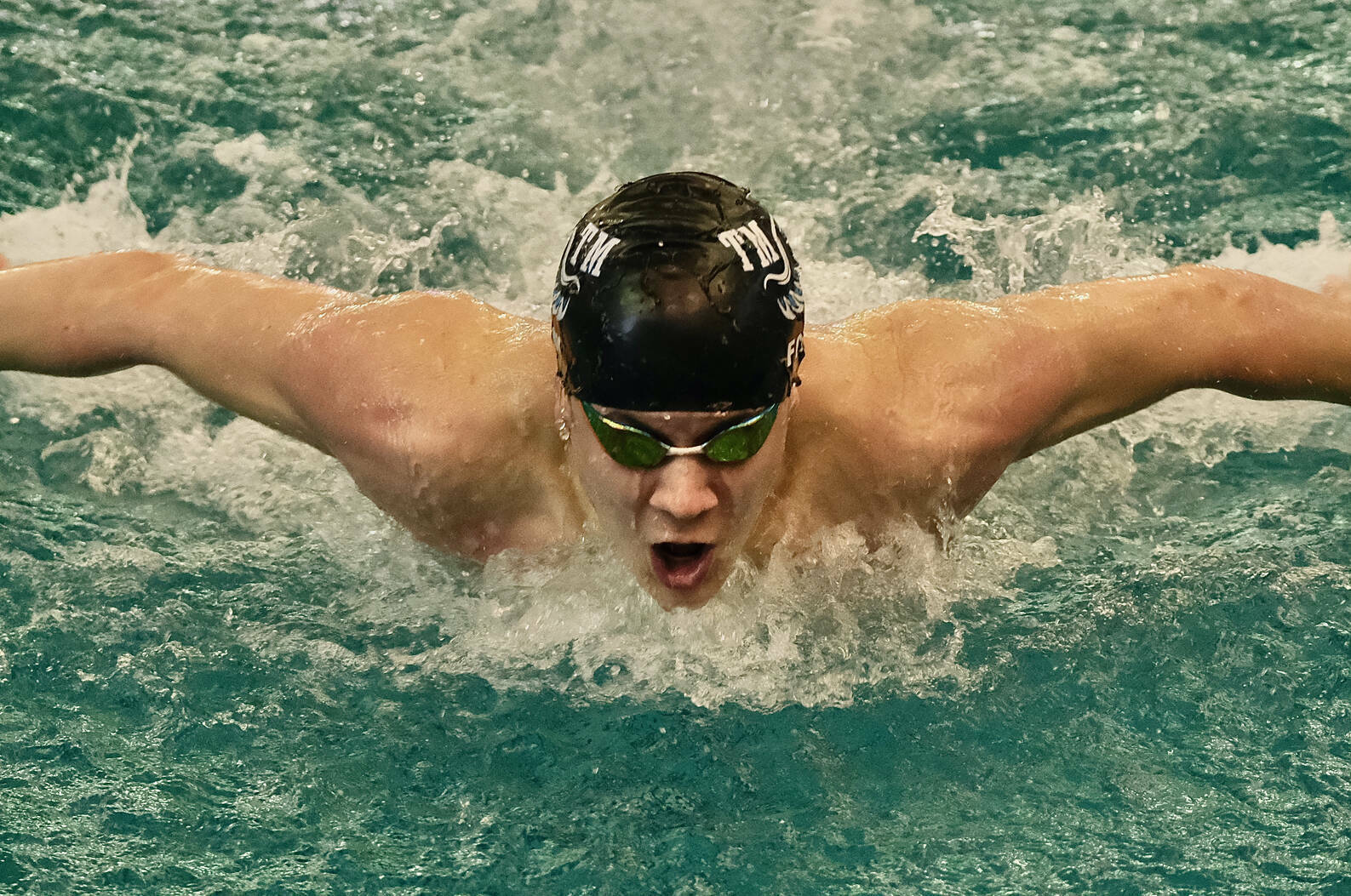 Juneau’s PJ Foy, shown winning the 2023 100 yard butterfly in 48.27 for Thunder Mountain High School during the ASAA state championships at the Dimond Park Aquatics Center on Nov. 4, 2023, qualified for the 2024 June Olympic Team Trials by swimming a 100 long course meters butterfly in a personal best 53.44 on March 16, 2024, at the Speedo Sectionals in Federal Way, Washington. (Klas Stolpe / Juneau Empire file photo)