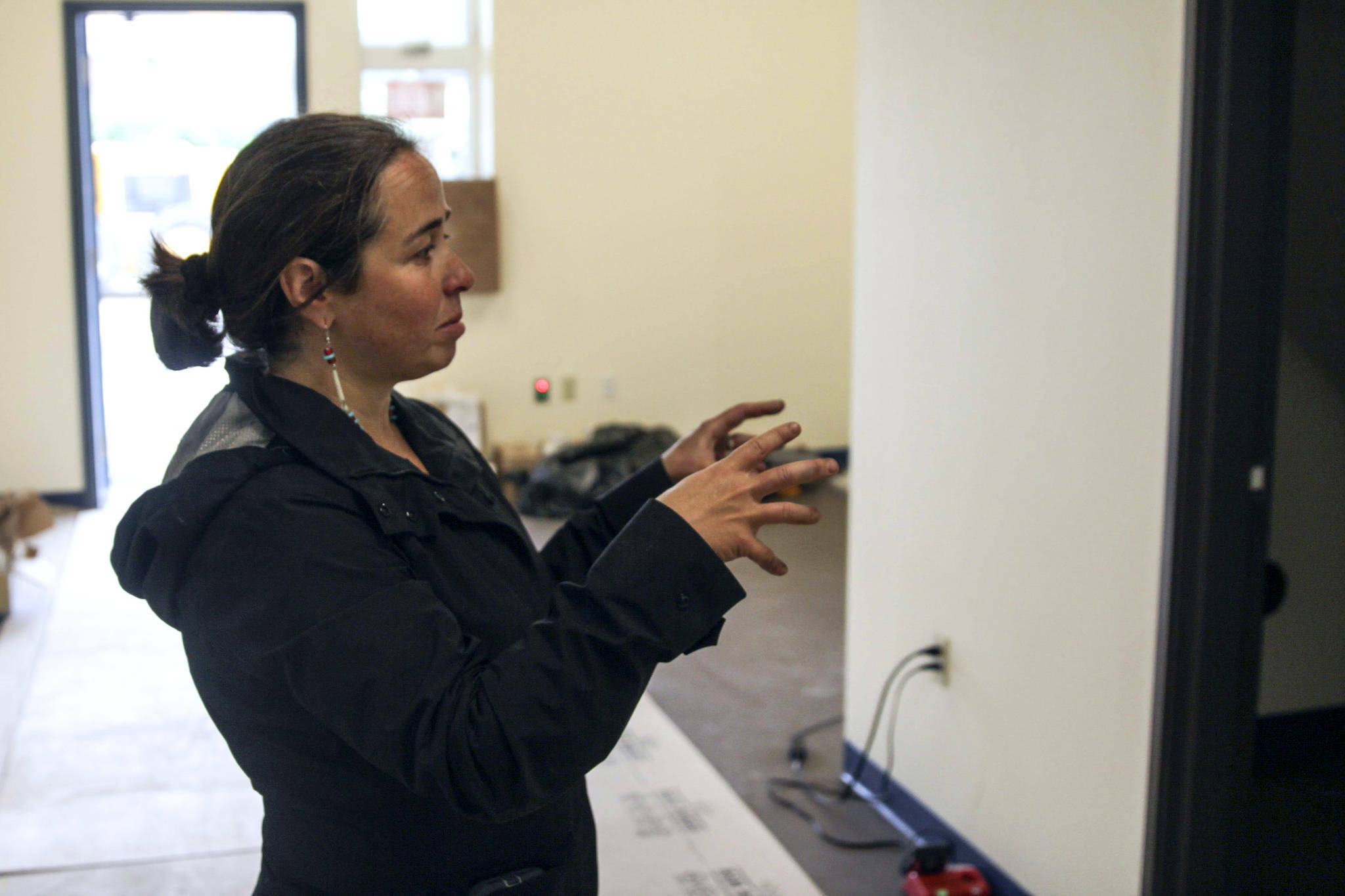 Glory Hall Executive Director Mariya Lovishchuk points out some of the features of the homeless shelter’s new location a few days before it opens in July of 2021. (Michael S. Lockett / Juneau Empire file photo)