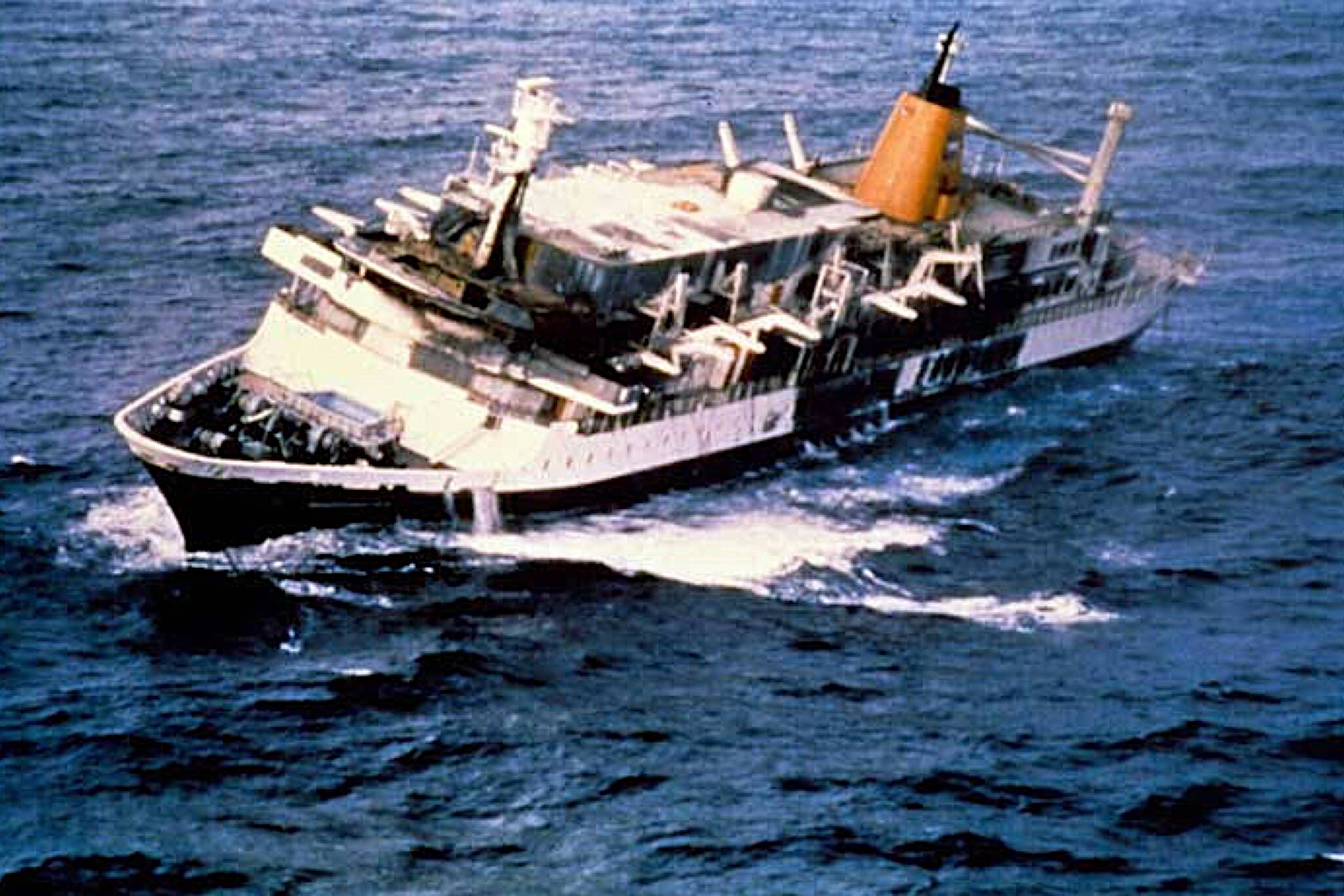 The burning cruise ship Prinsendam 200 miles from Juneau in the Gulf of Alaska in October 1980 after 519 people abandoned ship into lifeboats and were rescued. An oil leak in the engine room started a fire just as Juneau was celebrating its 100th birthday on Oct. 4. (Credit ASL-P313-12-06)