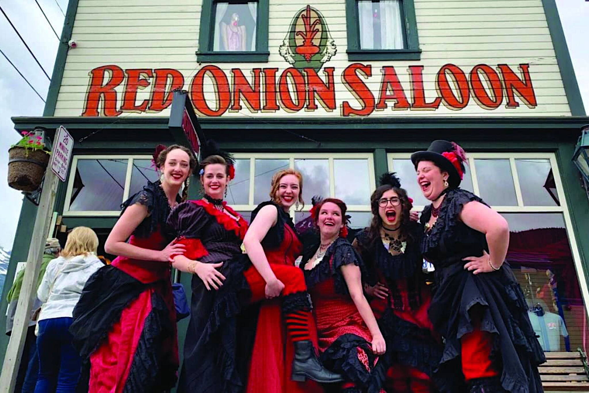 Employees gather in front the historic Red Onion Saloon in Skagway, which will be taken over by Juneau restaurant owner Tracy LaBarge at the end of the summer tourism season. (Photo courtesy of the Red Onion Saloon)