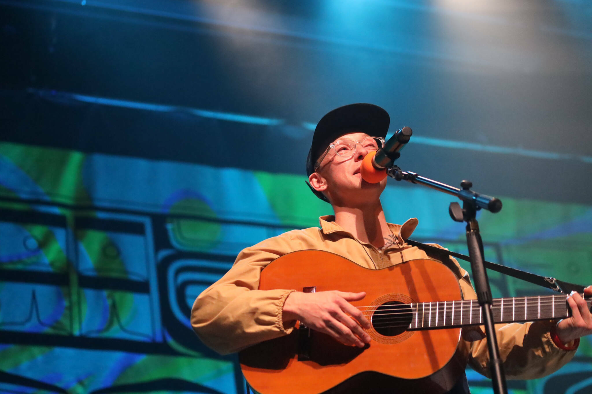 Anchorage musician Quinn Christopherson sings to the crowd during a performance as part of the final night of the Áak’w Rock music festival at Centennial Hall on Sept. 23, 2023. He is the featured musician at this year’s Climate Fair for a Cool Planet on Saturday. (Clarise Larson / Juneau Empire file photo)