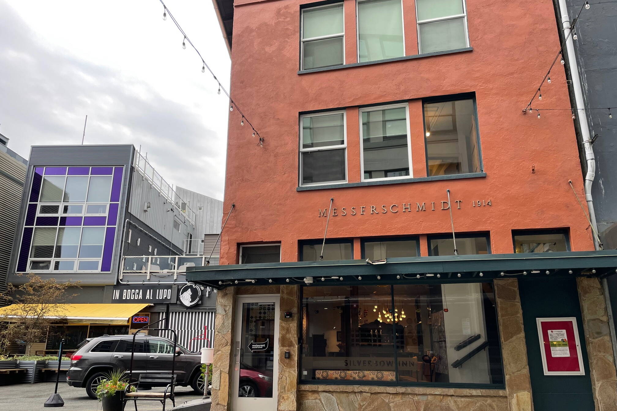 The Silverbow Inn on Second Street with attached restaurant “In Bocca Al Lupo” in the background. The restaurant name refers to an Italian phrase wishing good fortune and translates as “In the mouth of the wolf.” (Laurie Craig / Juneau Empire)