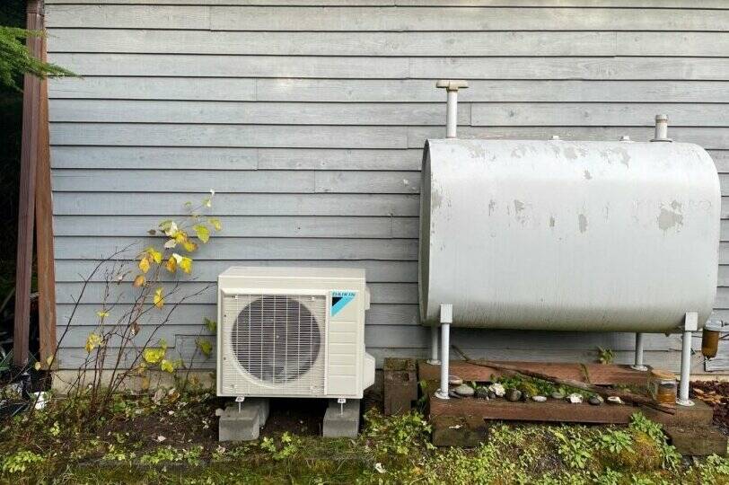 Juneau resident Cathy Muse sold her oil tank after installing an air source heat pump, transitioning her house entirely off fossil fuels. (Photo by Cathy Muse distributed by the U.S. Department of Energy)