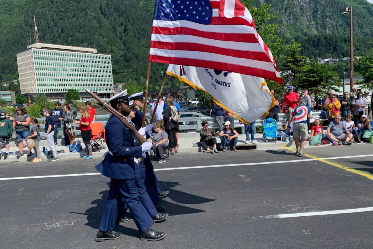 Coast Guardsmen march in the Juneau Fourth of July parade on July 4, 2021. (Dana Zigmund / Juneau Empire file photo)