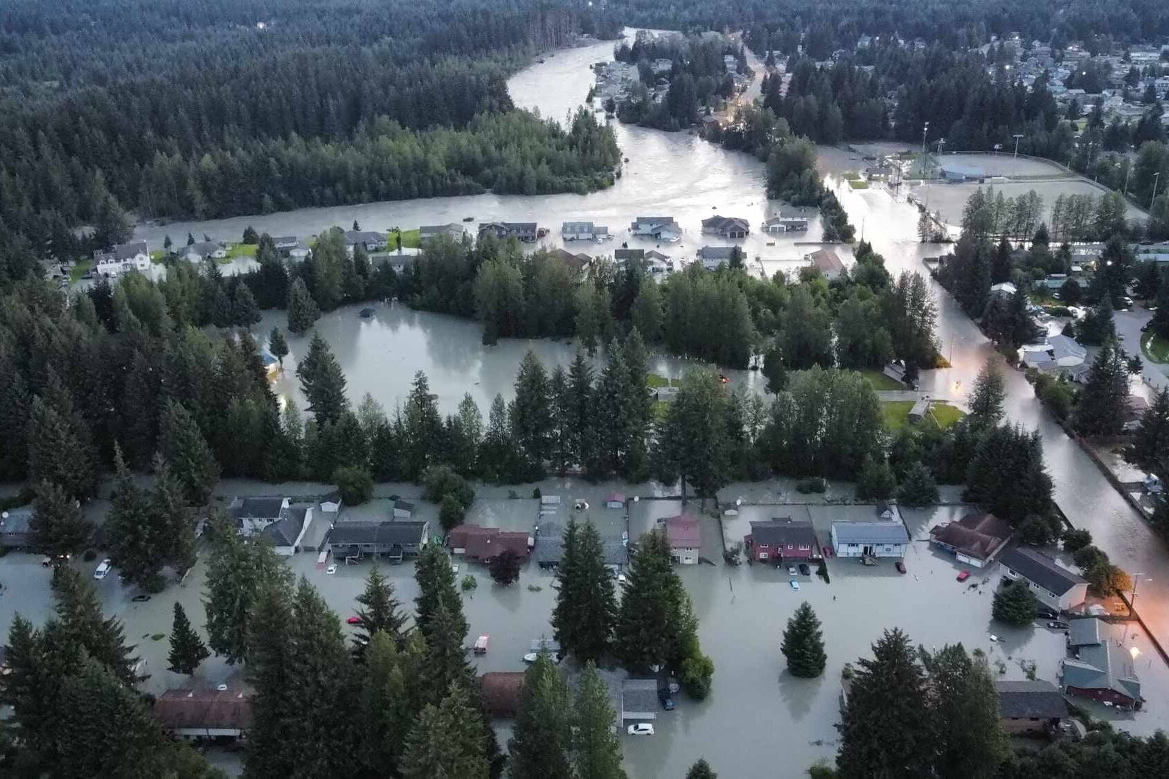 Homes and streets in the Mendenhall Valley are swamped by record flooding from the Mendenhall River on Tuesday morning. (Photo by Rich Ross)