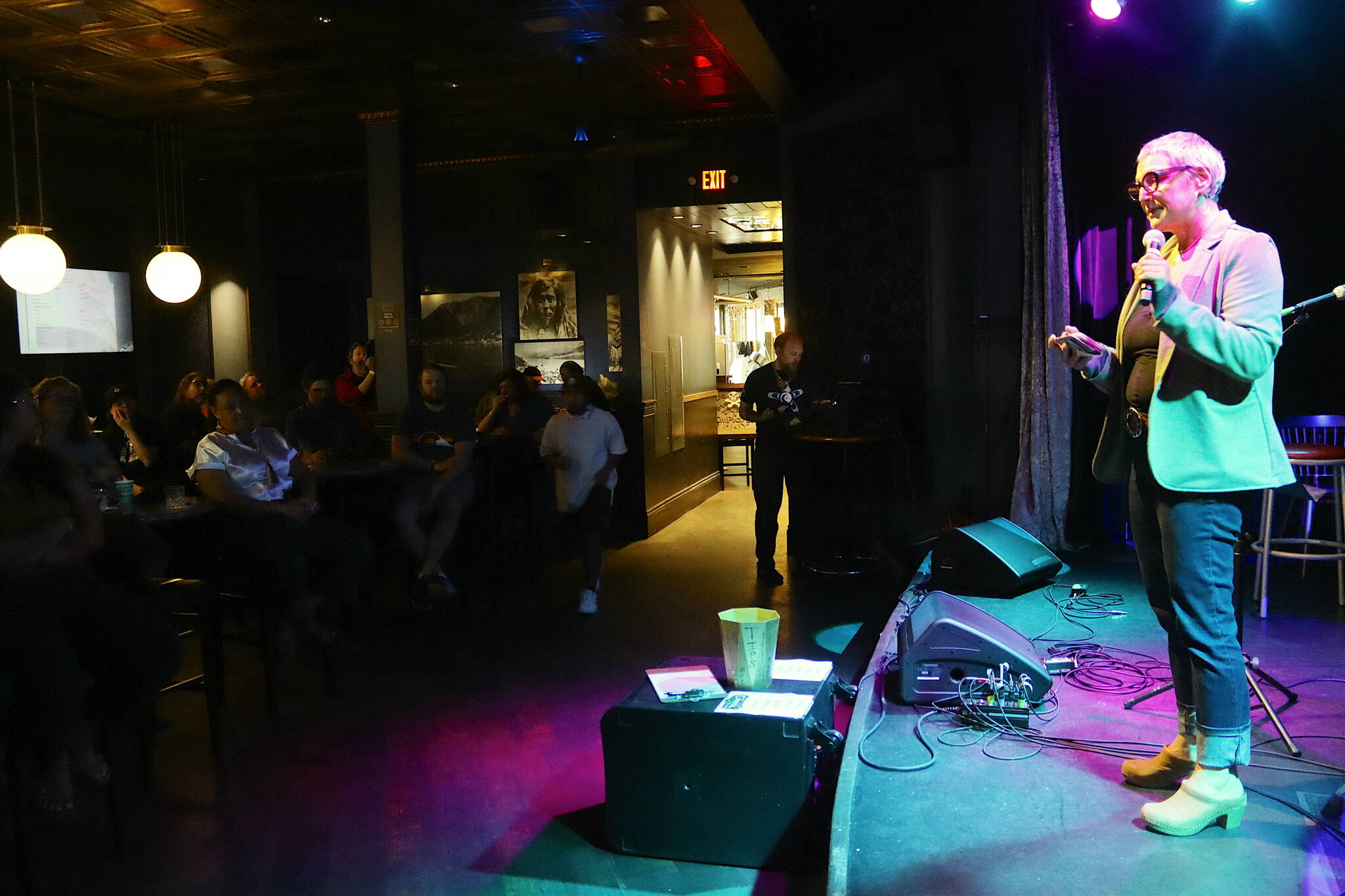 Salomé Starbuck, founder of the group Juneau Justice for Steve, calls for local policy and service changes to prevent a reoccurrence of the circumstances that led to Steven Kissack’s death during a memorial show for him Saturday night at the Crystal Saloon. (Mark Sabbatini / Juneau Empire)