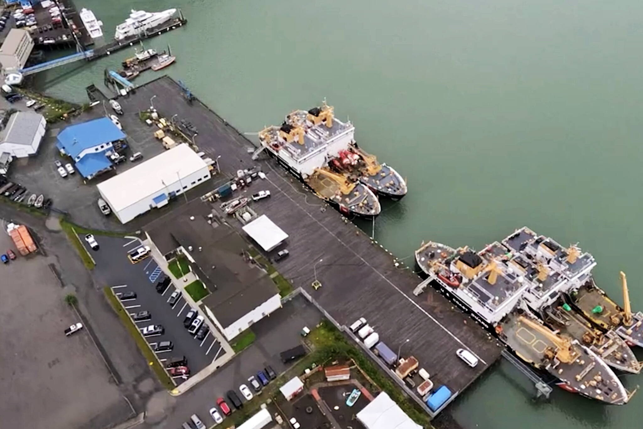 Buoy tenders dock at the U.S. Coast Guard station in downtown Juneau during the summer of 2023. The dock and adjacent property is where the Coast Guard plans to place support infrastructure for an icebreaker homeported in Juneau. (Screenshot from U.S. Coast Guard video)