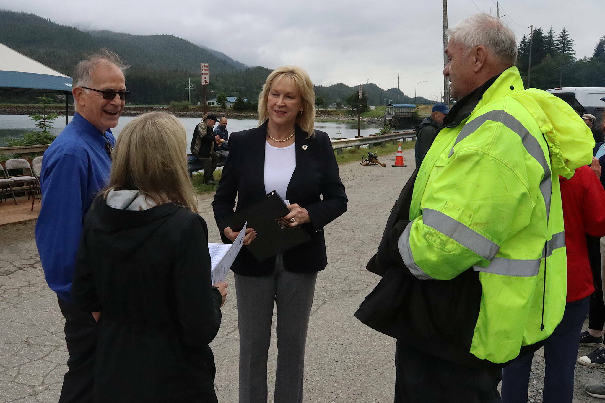 Lt. Gov. Nancy Dahlstrom talks with city officials before a ribbon-cutting ceremony Monday, June 24, 2024, at Aurora Harbor. She dropped out of the U.S. House race on Friday. (Mark Sabbatini / Juneau Empire file photo)