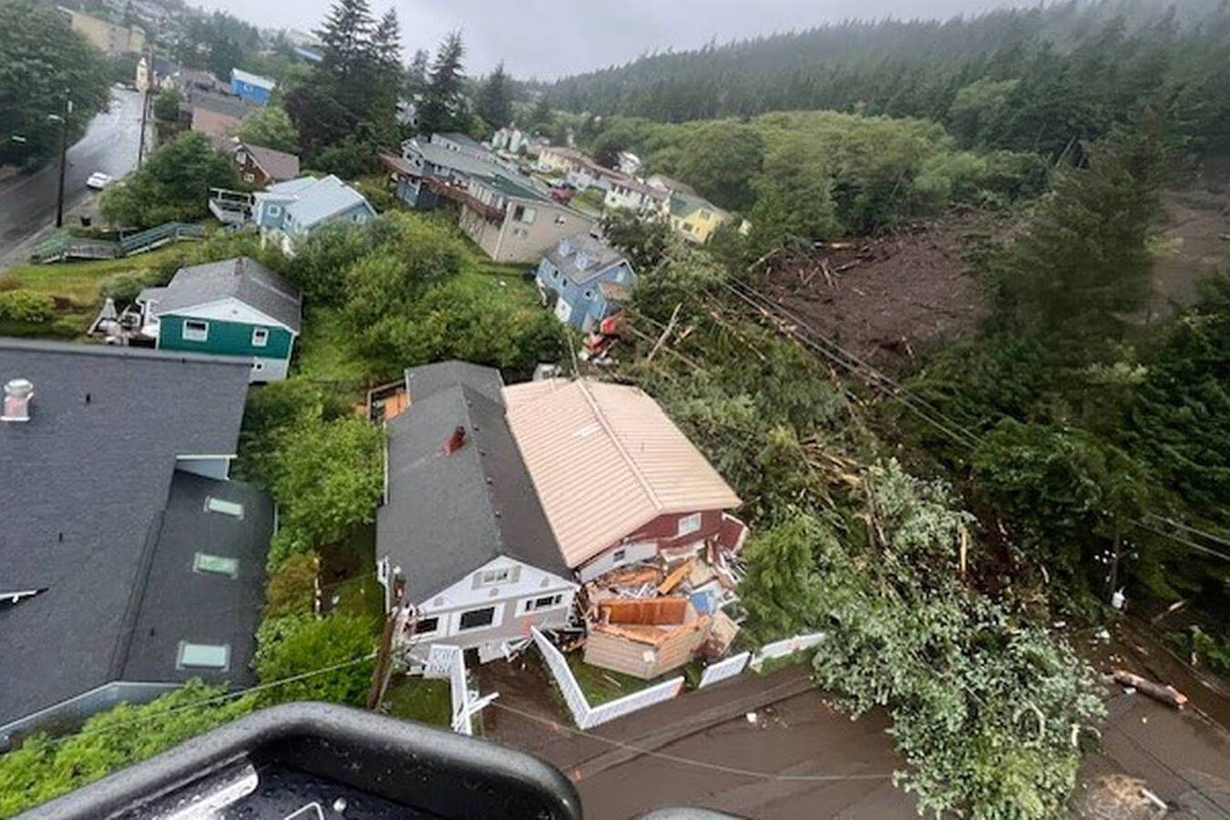 Homes in Ketchikan are damaged by a landslide on Sunday. (Ketchikan Gateway Borough photo)