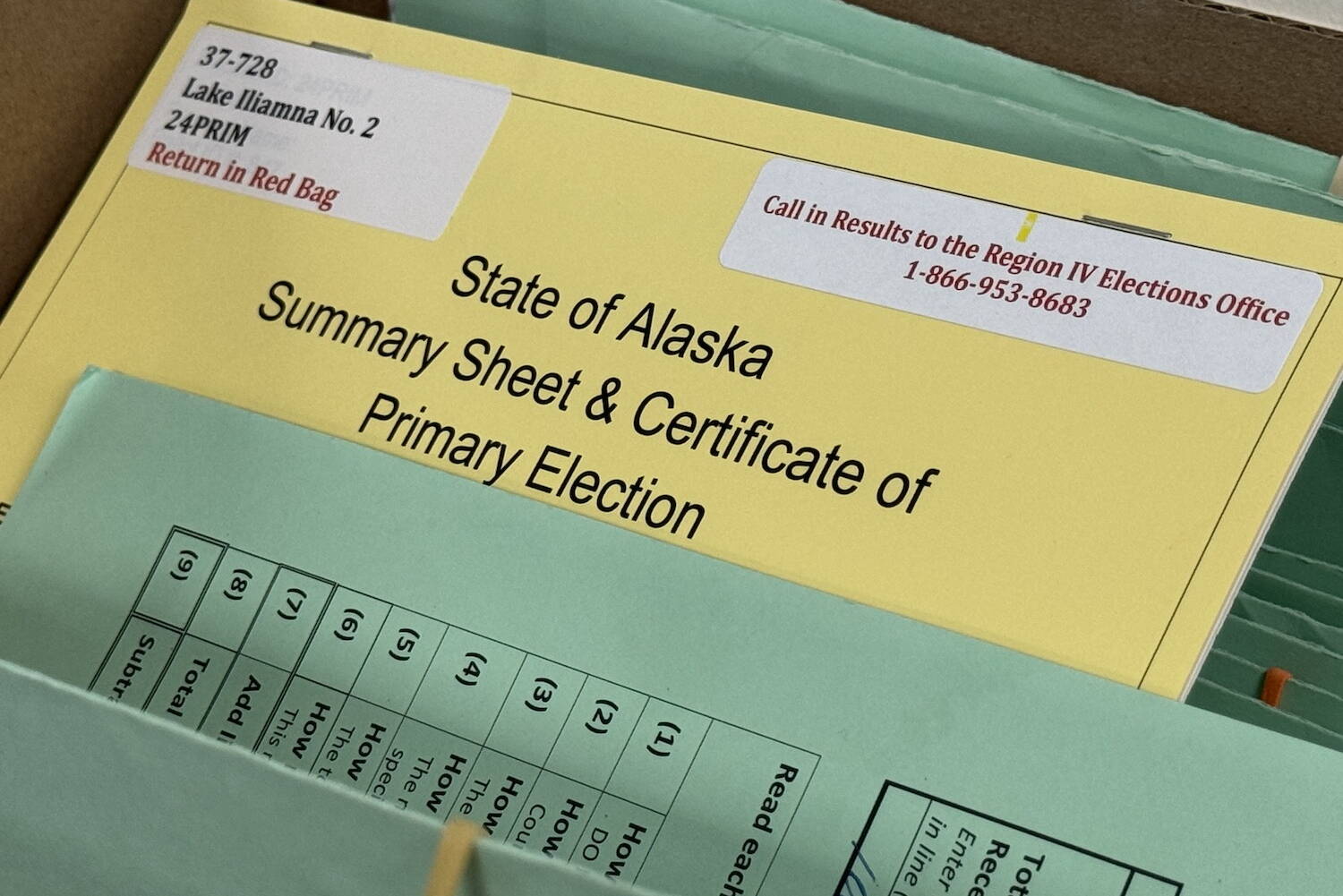 A summary sheet is seen during ballot review on Tuesday, Aug. 27, 2024, at the headquarters of the Alaska Division of Elections in Juneau. (James Brooks/Alaska Beacon)