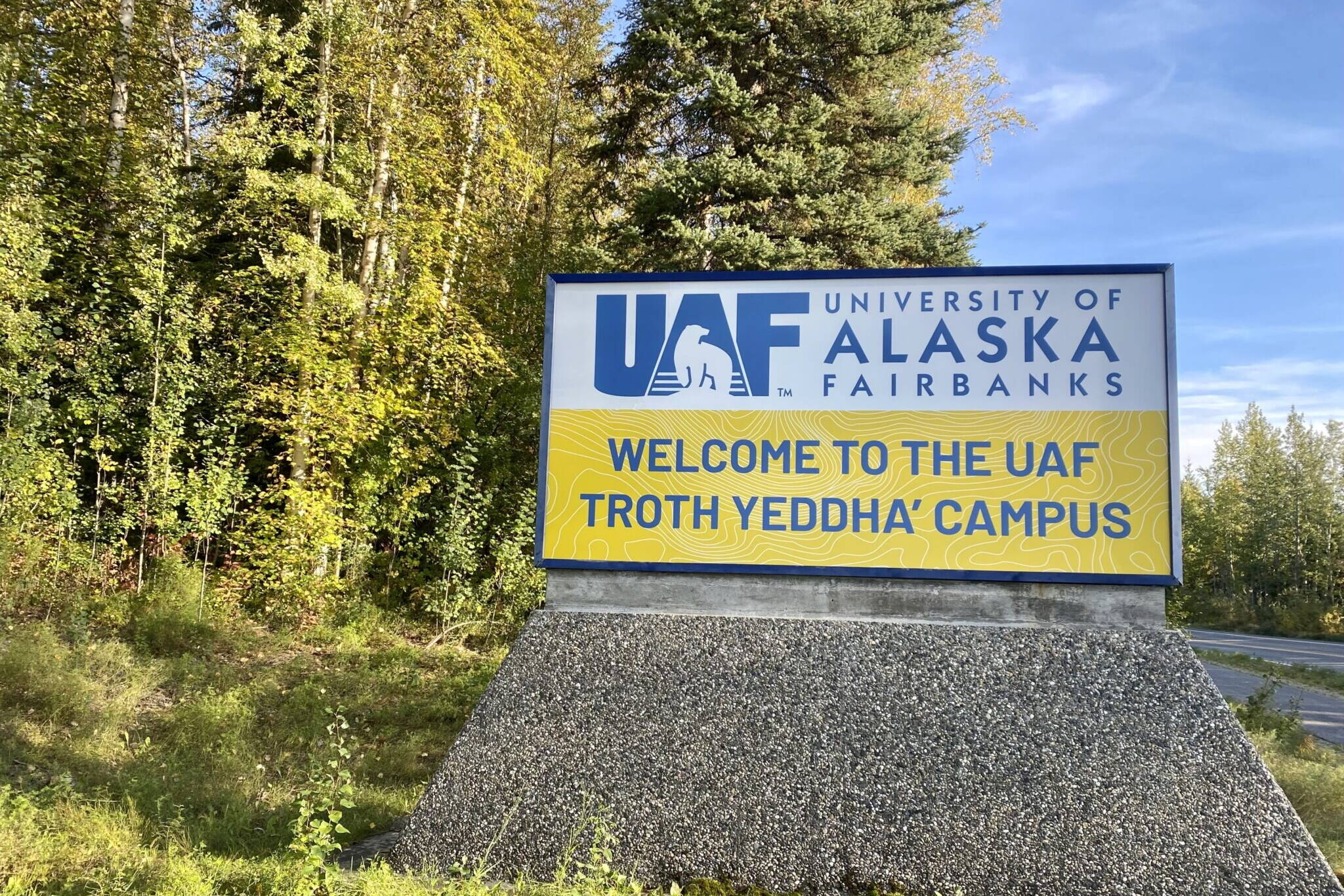 Fall sun hits the University of Alaska Fairbanks entrance sign on September 13, 2023. (Claire Stremple/Alaska Beacon)