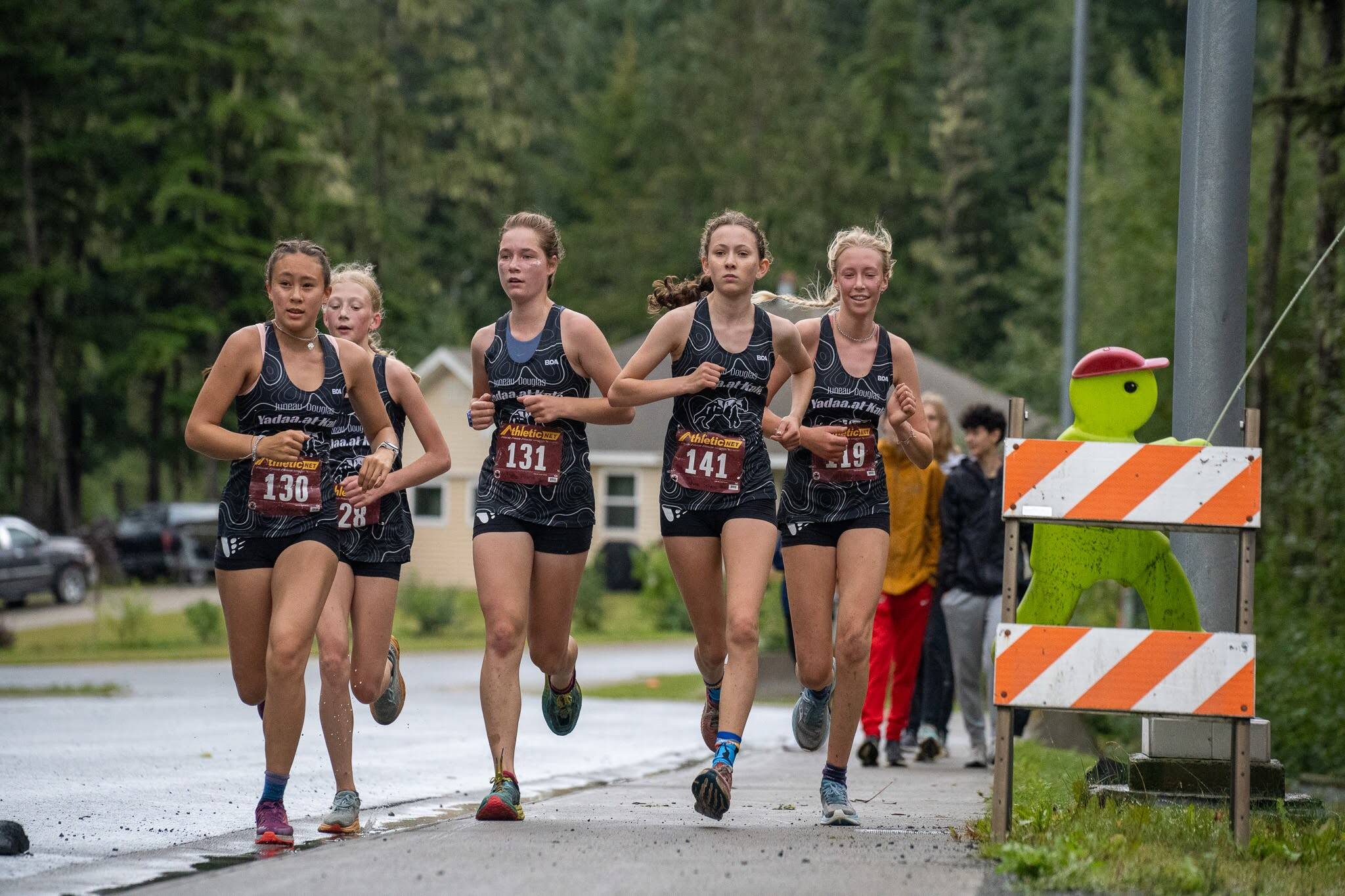 Juneau-Douglas High School: Yadaa.at Kalé girls lead the pack during the season-opening cross country meet at the state fairgrounds in Haines on Aug. 31, 2024. (Lex Treinen / For the Chilkat Valley News)