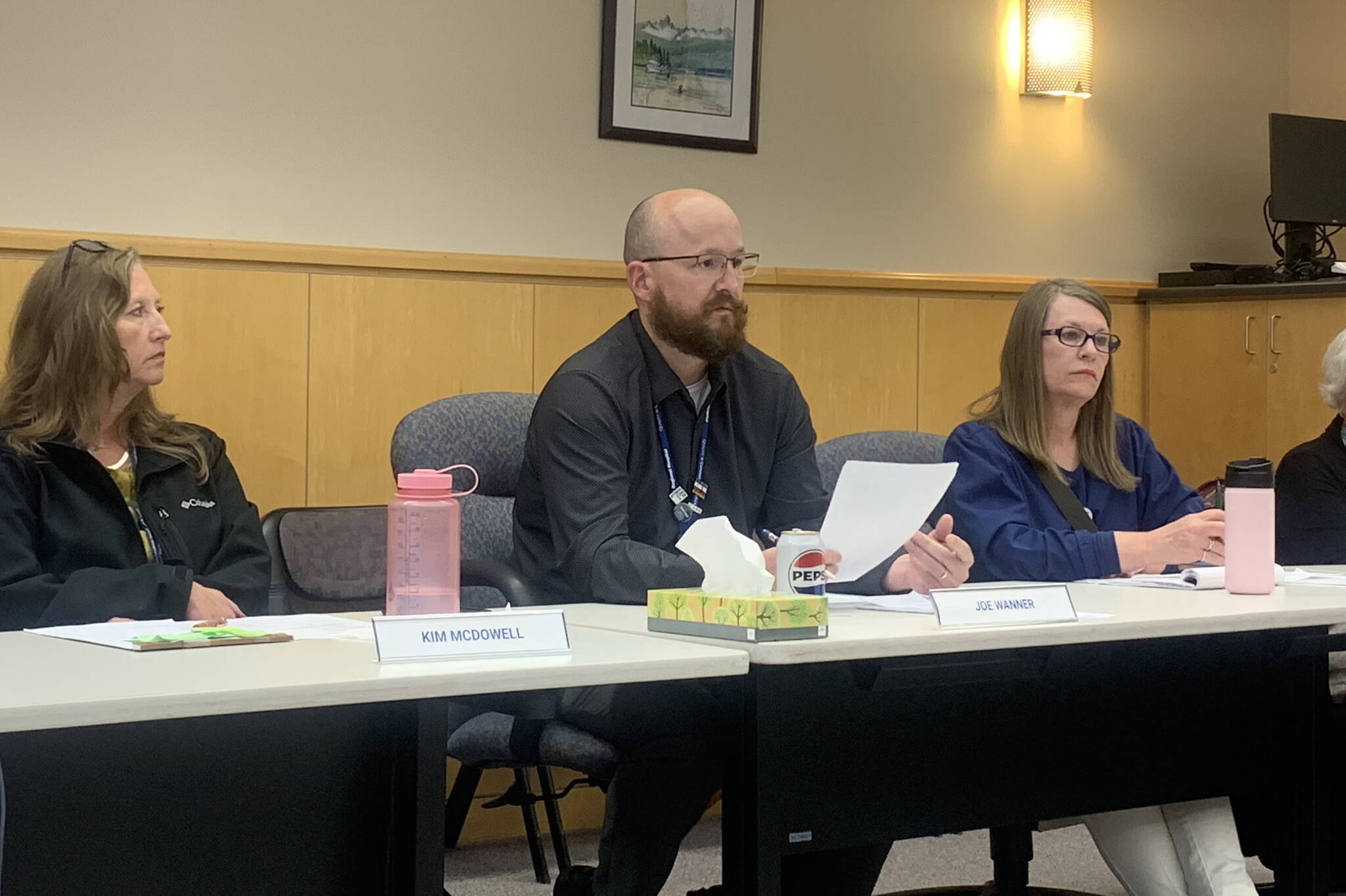 Joe Wanner (center), chief financial officer at Bartlett Regional Hospital, fills in to give the CEO report to the hospital’s board of directors during an Aug. 27 meeting. The appointment of Wanner as Bartlett’s new permanent CEO was announced Wednesday. (Mark Sabbatini / Juneau Empire file photo)