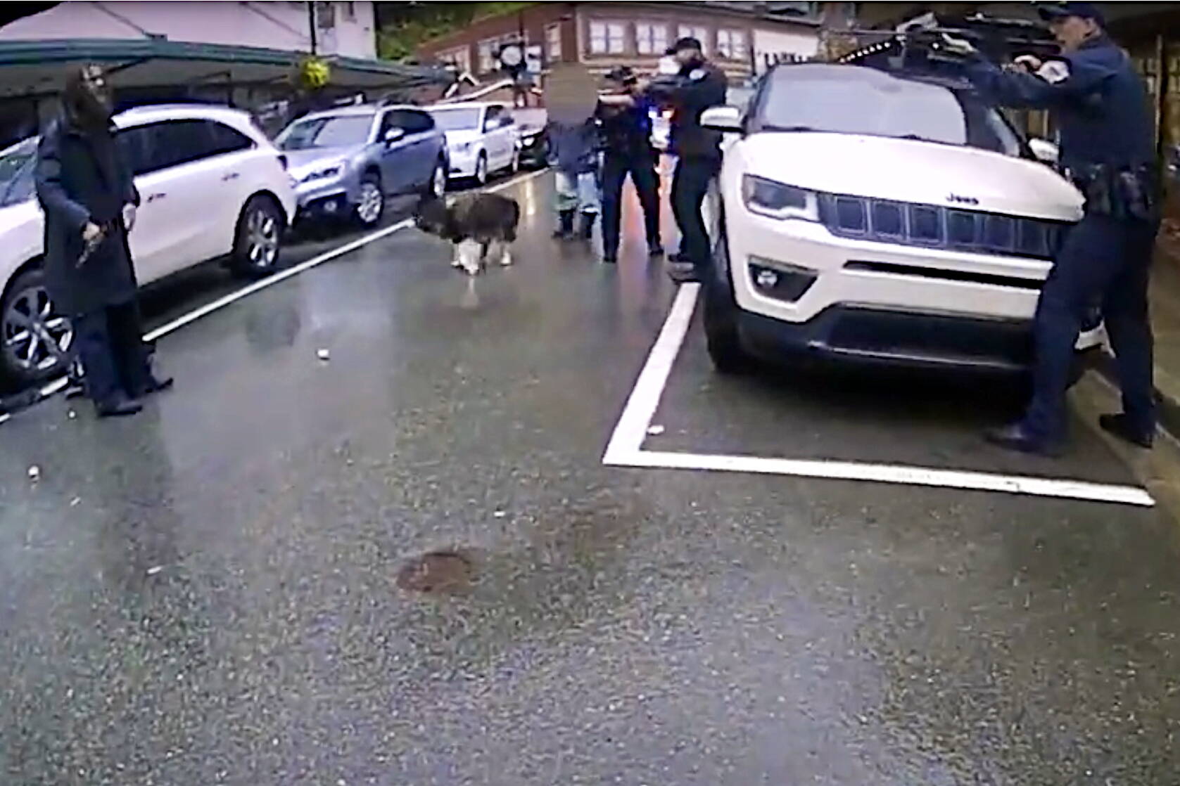 Steven Kissack (left) is seen holding a knife in this July 15 bodycam footage from Juneau Police Department Officer Terry Allen a few seconds before Kissack runs toward Allen. Two other officers at the scene said they shot Kissack because Allen was holding a non-lethal bean bag launcher that had fired off all of its rounds. (Screenshot from JPD bodycam video)