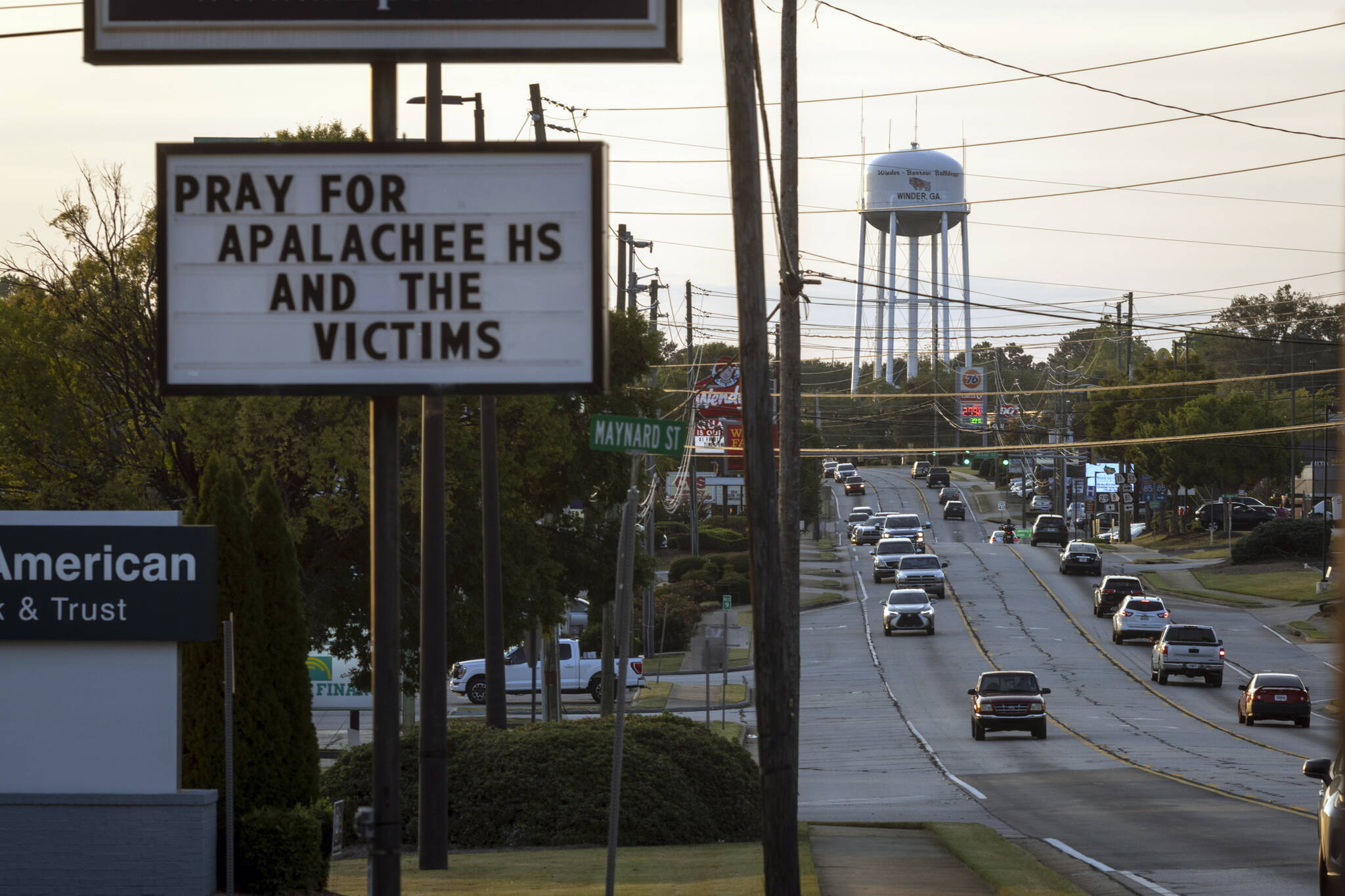 A local business displays a sign in support of the Apalachee High School shooting victims in Winder, Ga., on Monday, Sept. 9, 2024. The 1,900 students at Apalachee High School were just settling into the rhythms of a new year before a freshman killed two teachers and two students. (Christian Monterrosa/The New York Times)