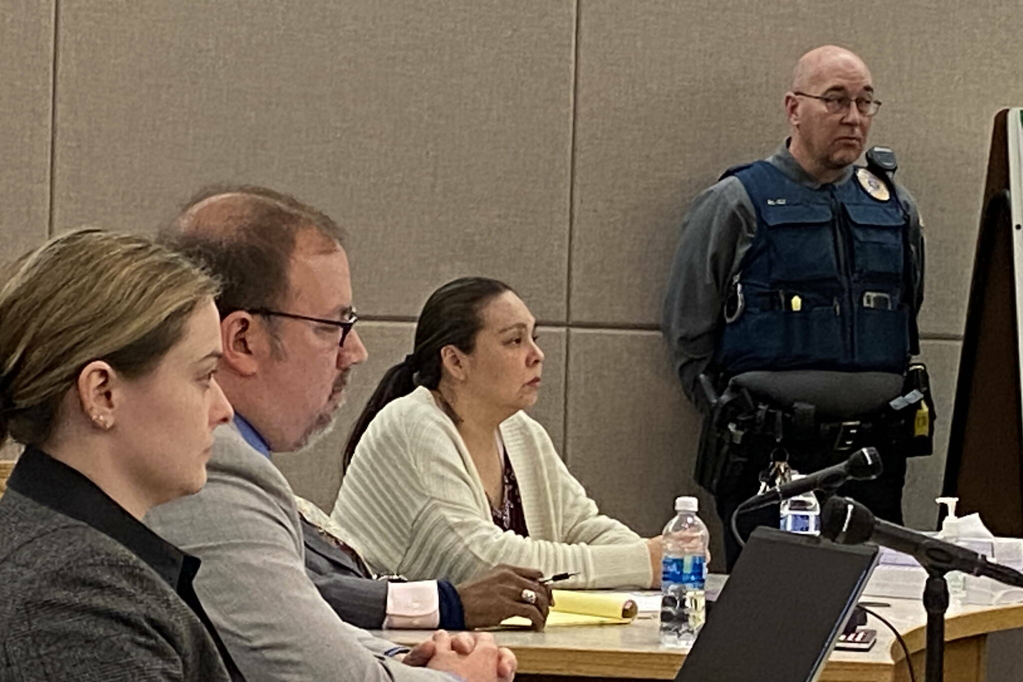 Sonya Taton, center, listens to the verdict as she is found guilty on all five counts, including second-degree murder, during her trial in Superior Court in Juneau on Nov. 17, 2023. (Meredith Jordan / Juneau Empire file photo)