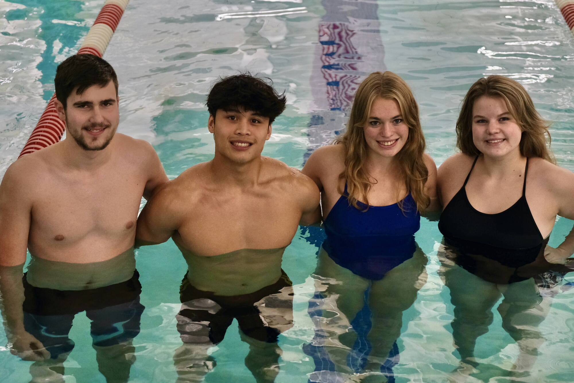 Juneau-Douglas High School: Yadaa.at Kalé senior swim captains Matthew Godkin, Matthew Plang, Pacific Ricke and Nova Hines were chosen by teammates to lead the Crimson Bears in the pool this season. Godkin and Hines swam last year for the now defunct Thunder Mountain High School Falcons. (Klas Stolpe/For the Juneau Empire)