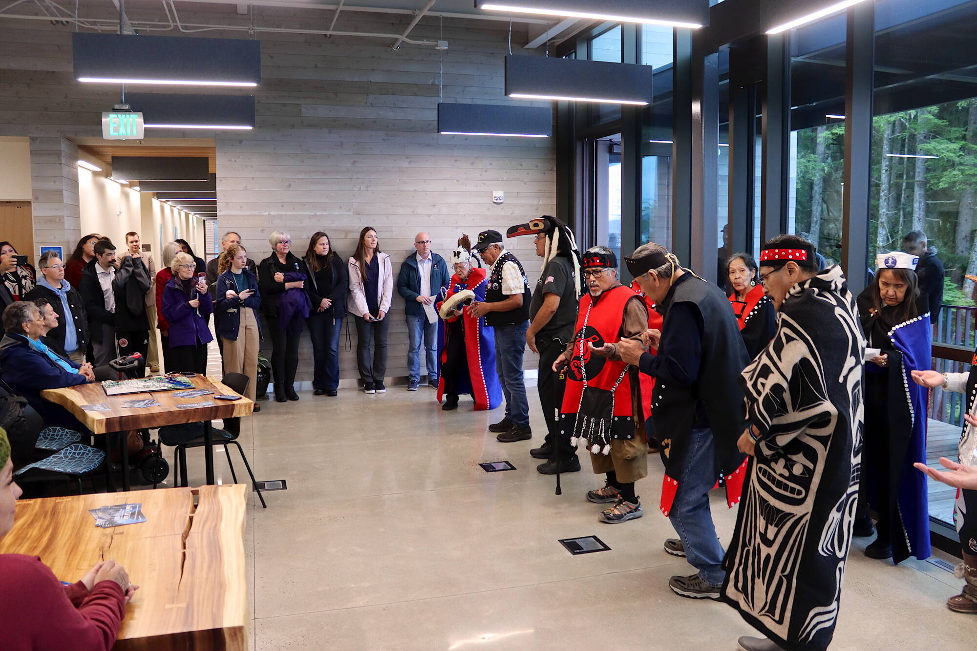 The Tlingit and Haida Elder Dance Group performs during a ribbon-cutting ceremony for the new Áakʼw Tá Hít building at the University of Alaska Southeast on Friday. (Mark Sabbatini / Juneau Empire)