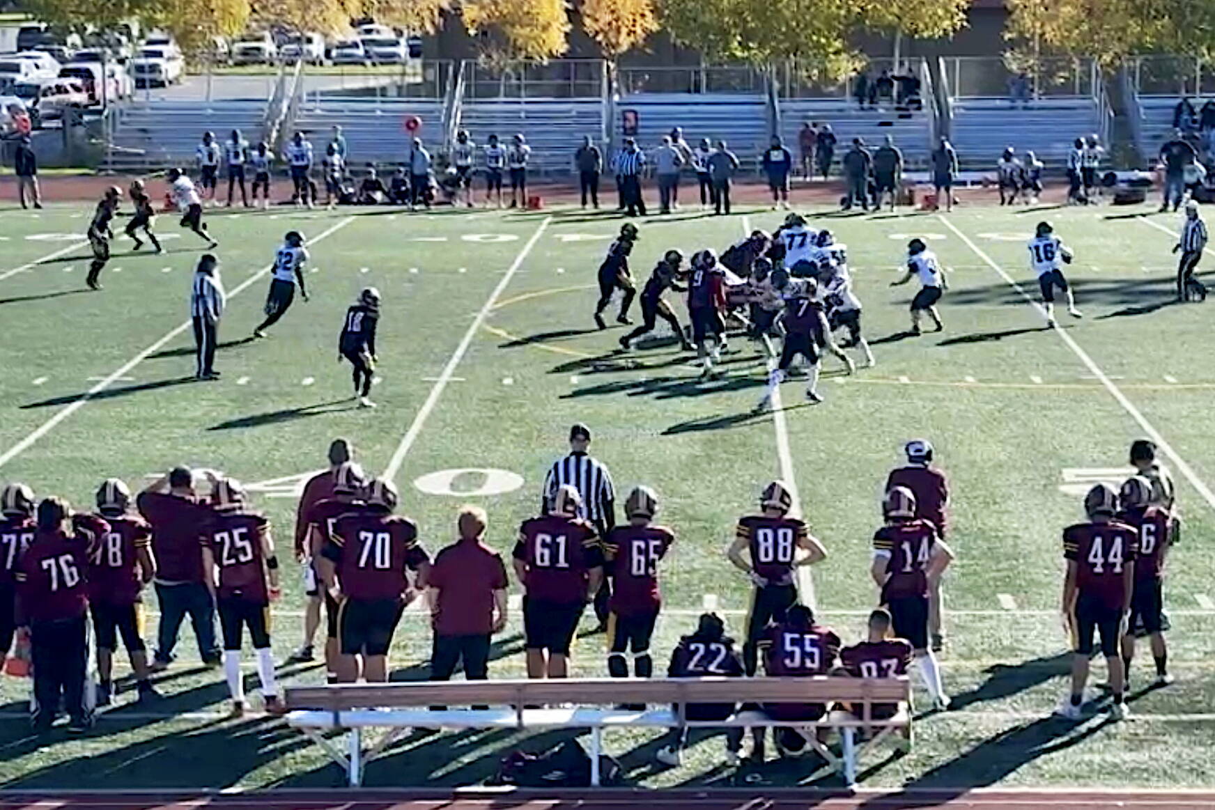 Caleb Ziegenfuss rolls out to pass for Juneau-Douglas High School: Yadaa.at Kalé during Saturday’s game against Dimond High School in Anchorage. (Screenshot from Juneau Huskies Football livestream)