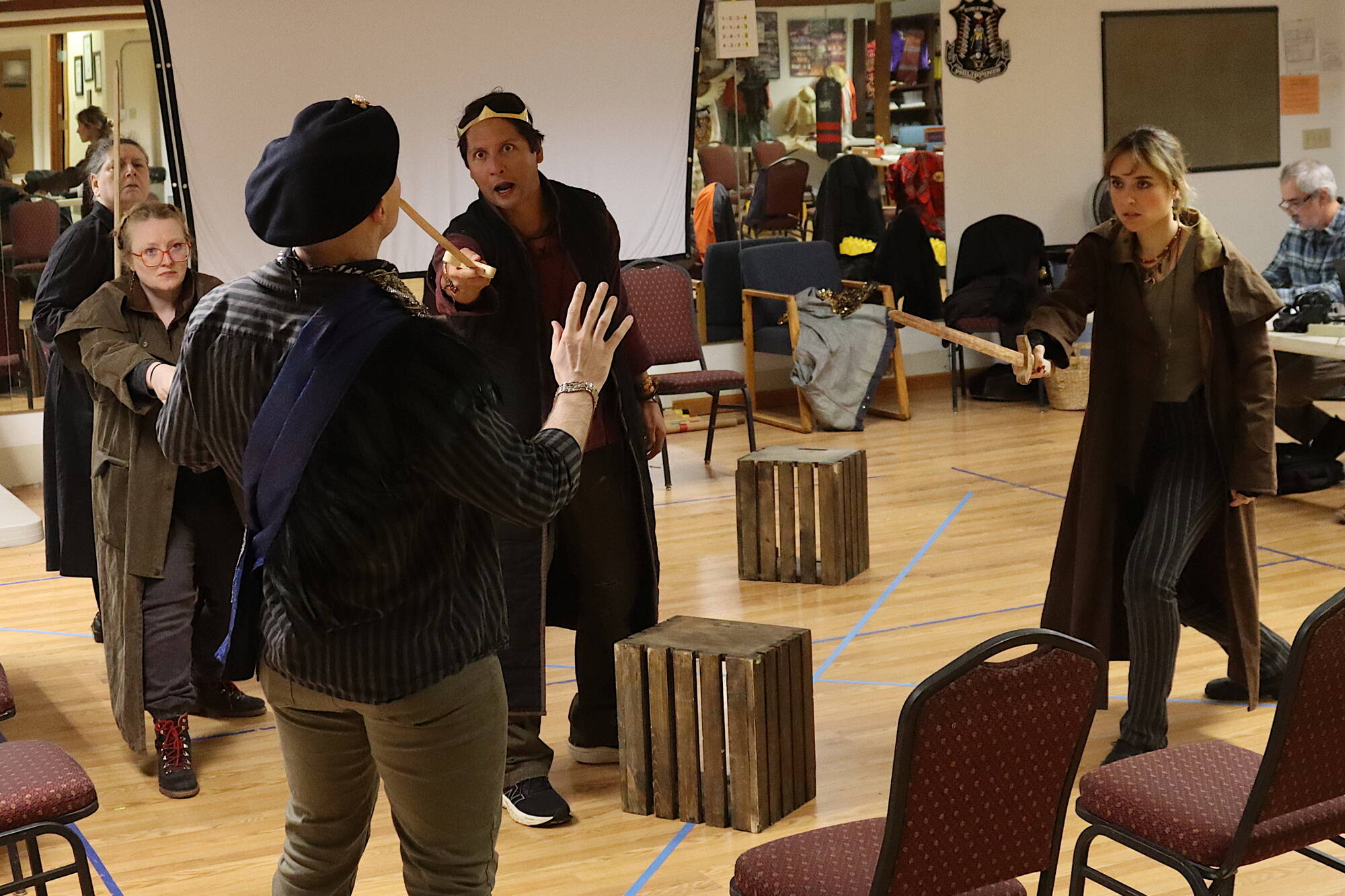 Cast members of “Henry V” rehearse Wednesday at the Filipino Community Hall for the Theater Alaska production opening Friday. (Mark Sabbatini / Juneau Empire)