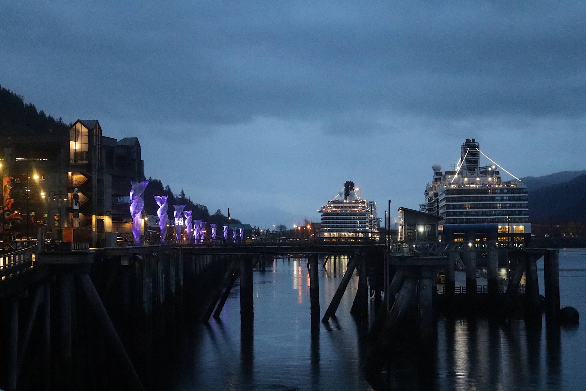 The Koningsdam and Eurodam cruise ships remain docked in Juneau early Tuesday morning after arriving Monday, due to a storm that brought high winds to many parts of Southeast Alaska. (Mark Sabbatini / Juneau Empire)