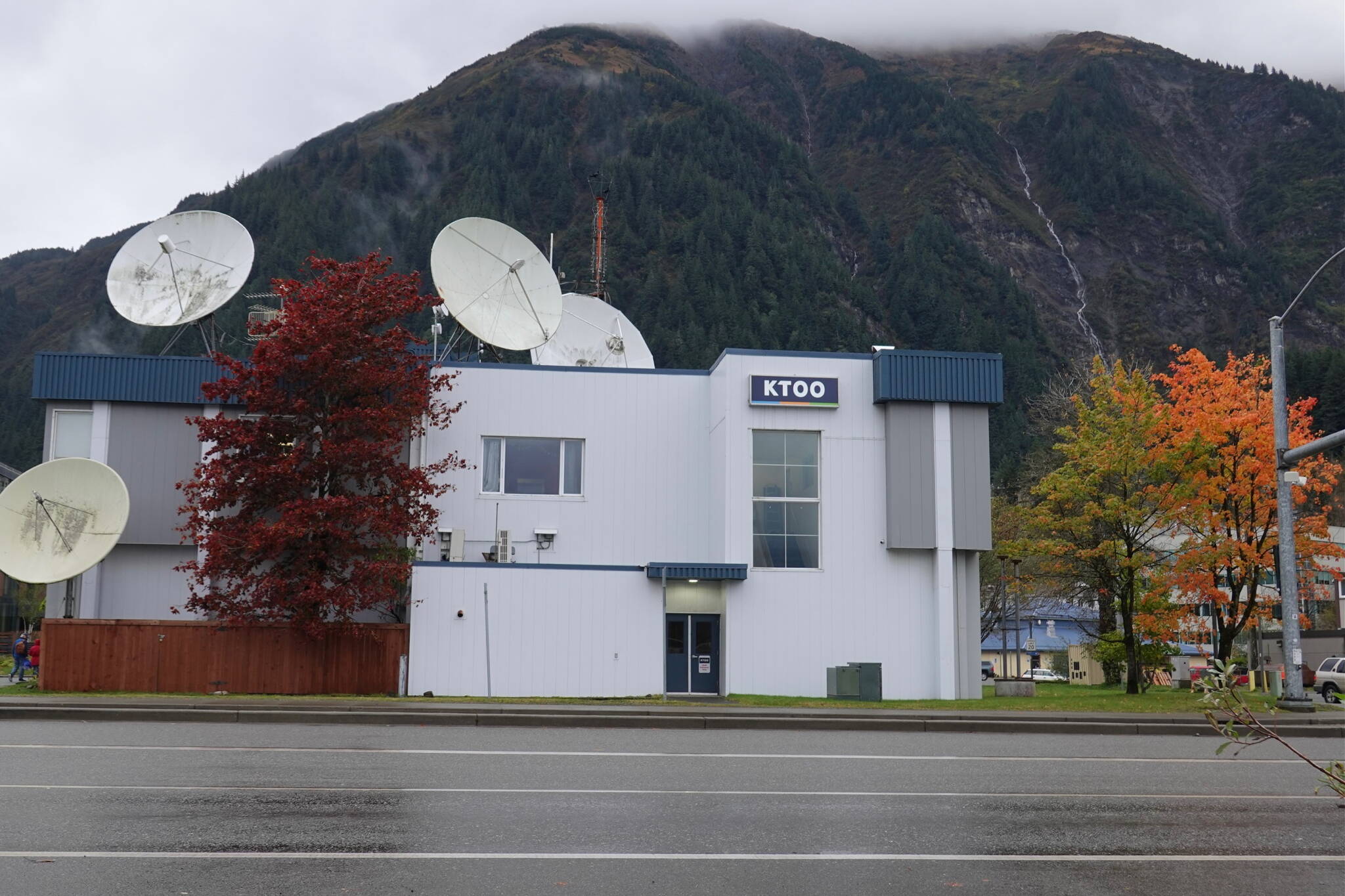 The present-day KTOO public broadcasting building, built in 1959 for the U.S. Army’s Alaska Communications System Signal Corps, is located on filled tidelands near Juneau’s subport. Today vehicles on Egan Drive pass by the concrete structure with satellite dishes on the roof that receive signals from NPR, PBS and other sources. (Laurie Craig / Juneau Empire)