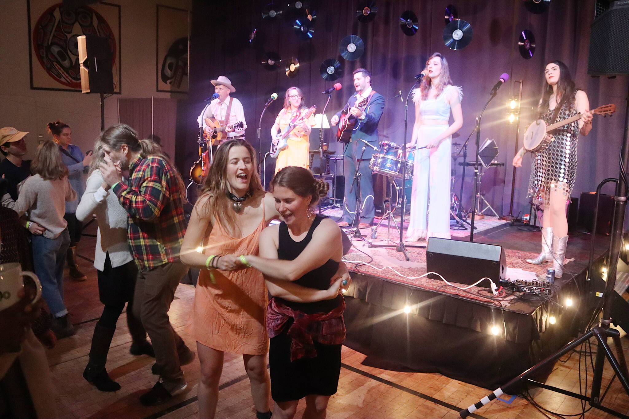 People dance to music by The Muskeg Collective during KTOO’s 50-Fest on Saturday night at the Juneau Arts and Culture Center. (Mark Sabbatini / Juneau Empire)