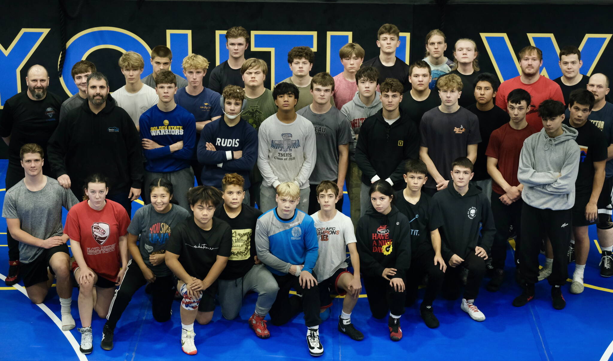 Members of the Juneau-Douglas High School: Yadaa.at Kalé Crimson Bears wrestling team are shown at the Juneau Wrestling Center during practice on Wednesday. (Klas Stolpe/Juneau Empire)