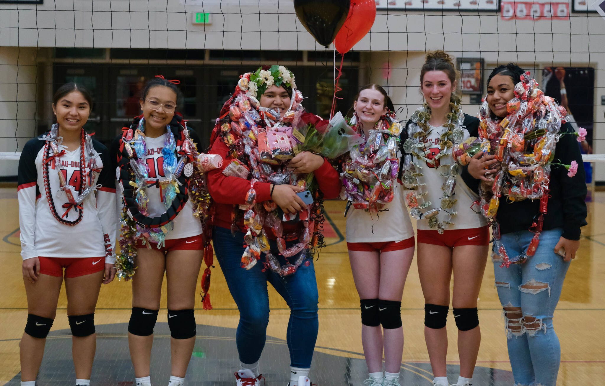 Juneau-Douglas High School: Yadaa.at Kalé volleyball seniors Neveah Alexander, Nina Jeter, Maxi Lehulie, Tatum Billings, Evelyn Richards and Val Mausia were honored before Friday night’s game against Wasilla at the George Houston Gymnasium. (Klas Stolpe/Juneau Empire)