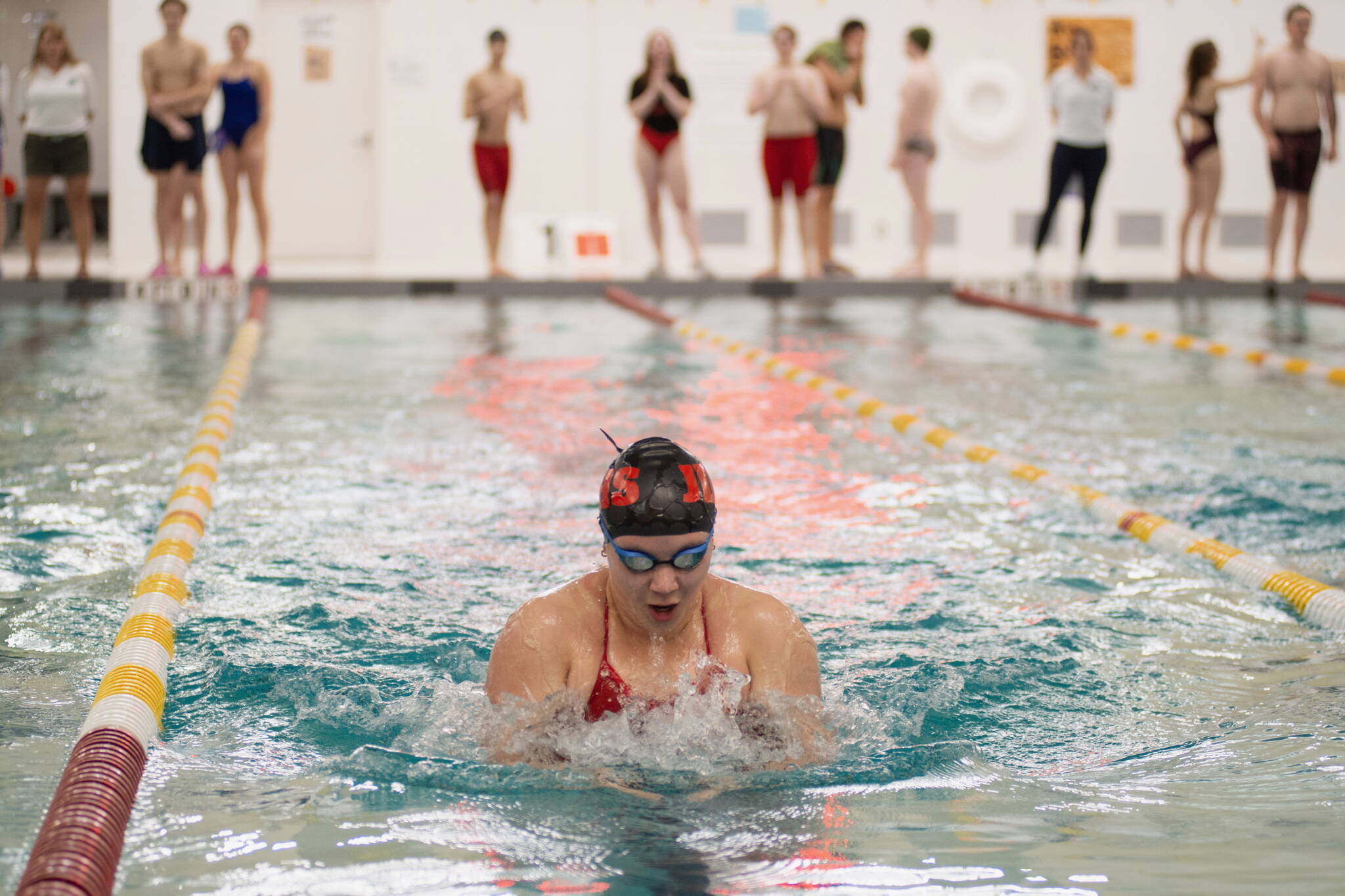 Juneau-Douglas High School: Yadaa.at Kalé senior Amy Liddle during her win in the girls 100 yard breaststroke on Friday in Sitka. (James Poulson/Daily Sitka Sentinel)