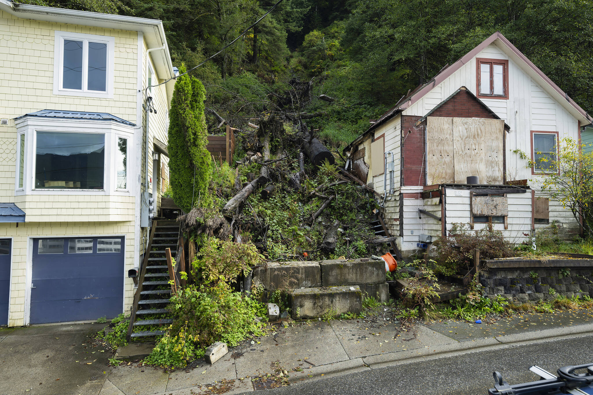 Debris left behind from a 2022 landslide, on Gastineau Avenue in Juneau on Sept. 26, 2024. Deadly landslides are increasing around the world, but in parts of Alaska, maps of the hazards remain controversial. (Christopher Miller/The New York Times)