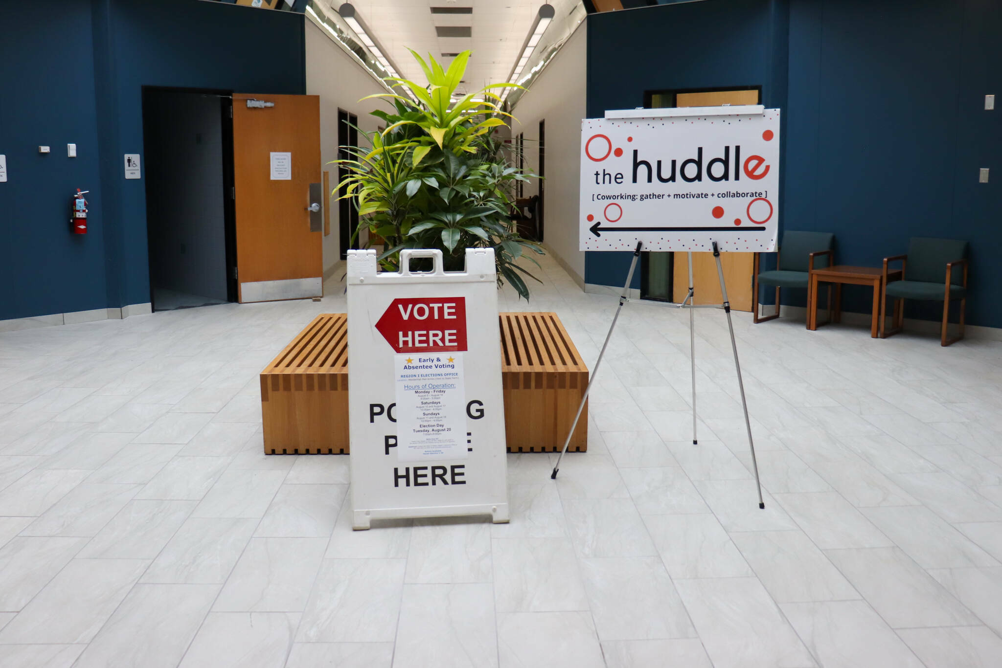 A sign inside the Mendenhall Mall Annex points toward a polling place during the statewide primary election on Tuesday, Aug. 20, 2024. (Jasz Garrett / Juneau Empire file photo)