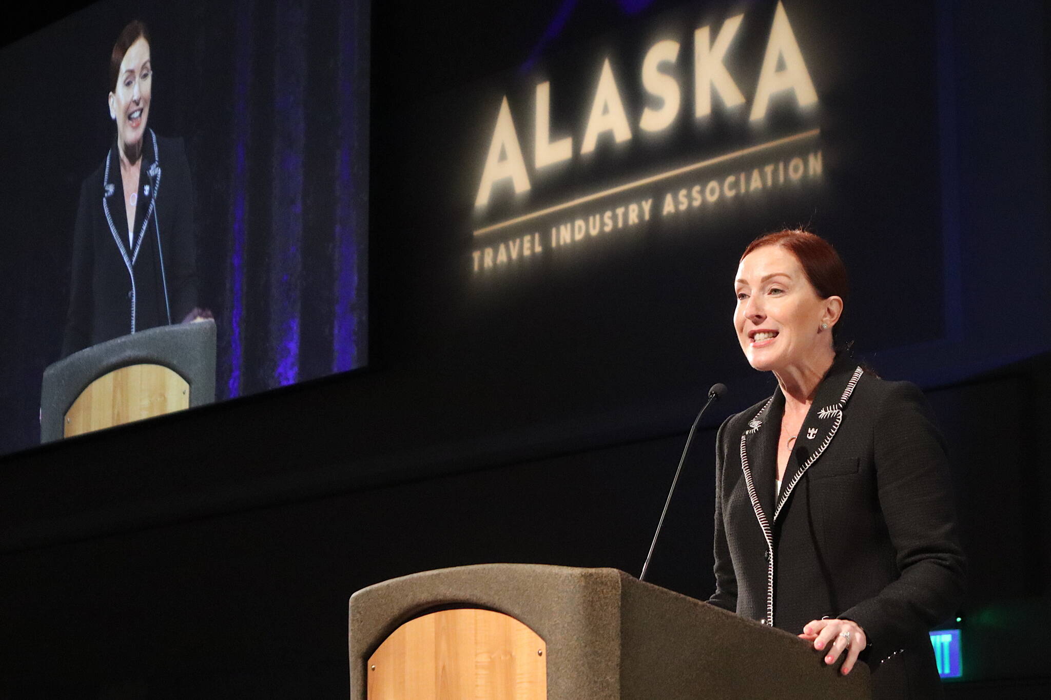 Celebrity Cruises President Laura Hodges Bethge discusses current and future plans for parent company Royal Caribbean Group during a keynote speech Tuesday at the Alaska Travel Industry Association convention at Centennial Hall. (Mark Sabbatini / Juneau Empire)