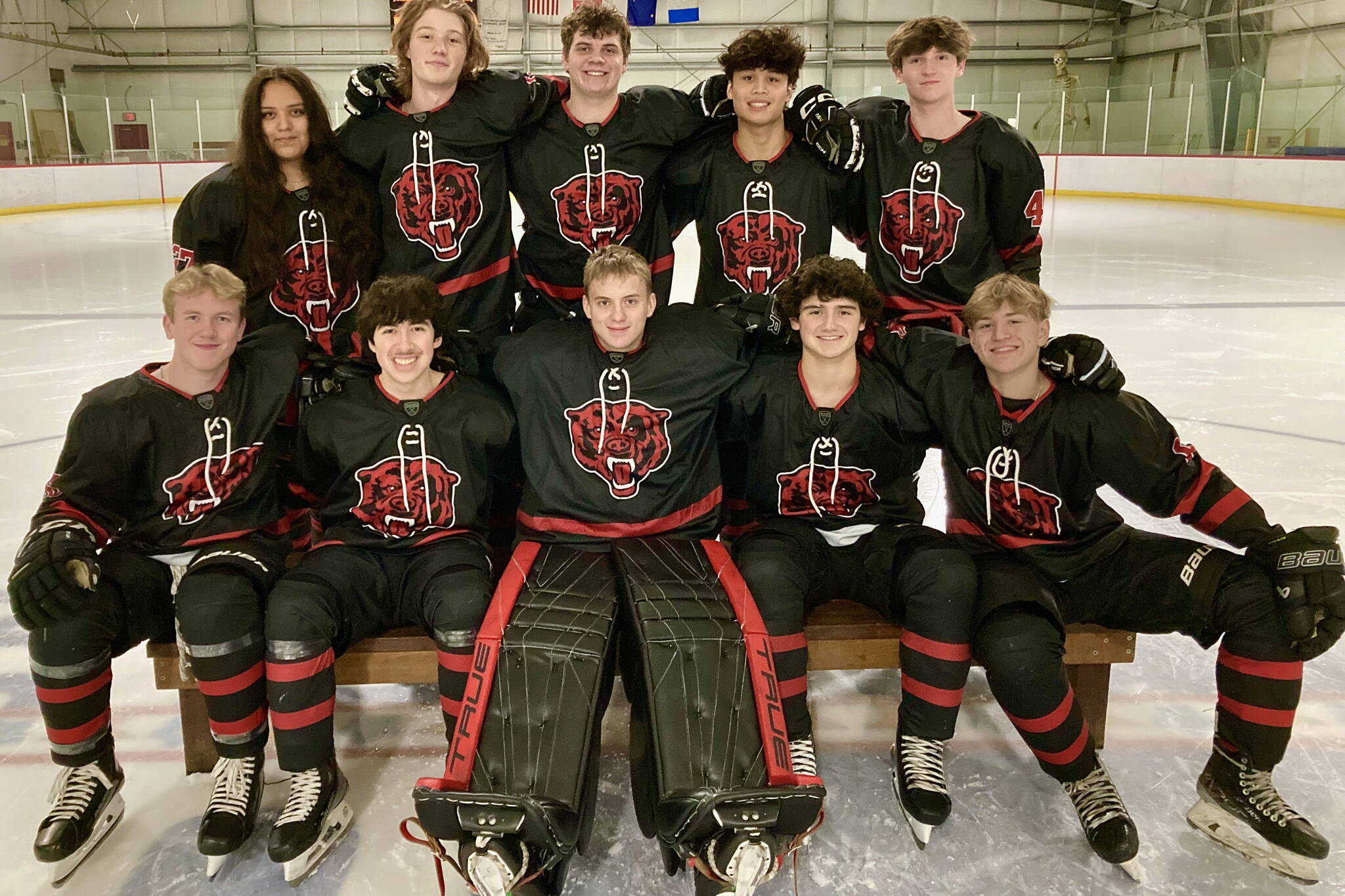 The 2024-25 Juneau-Douglas High School: Yadaa.at Kalé Crimson Bears hockey seniors are (front row l-r) Loren Platt, Emilio Holbrook, Caleb Friend, Dylan Sowa and Zander Smith. (back l-r) Angel Aranda-Jackson, Carter Miller, Luke Bovitz, Matthew Plang and Ike Puustinen. (Klas Stolpe / Juneau Empire)